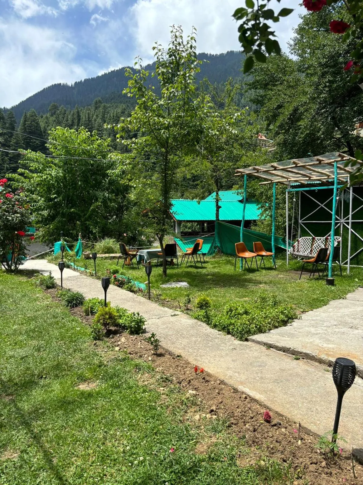 Garden view in Beholden Stay And Cafe - A Luxury Boutique Hotel In Manali