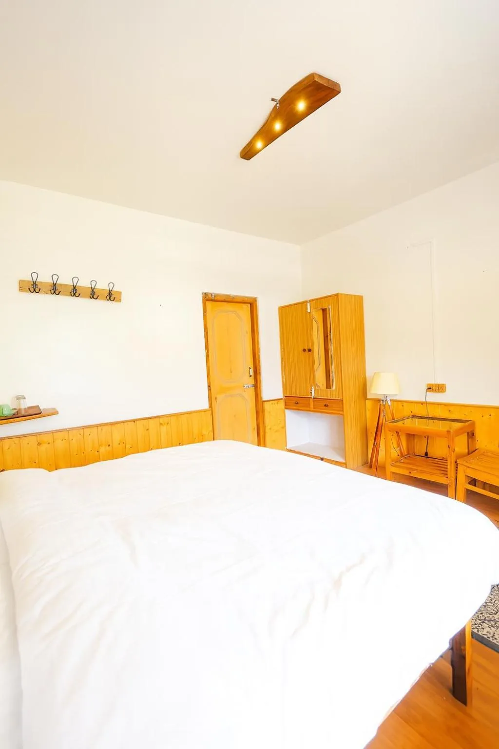 Bed in Beholden Stay And Cafe - A Luxury Boutique Hotel In Manali