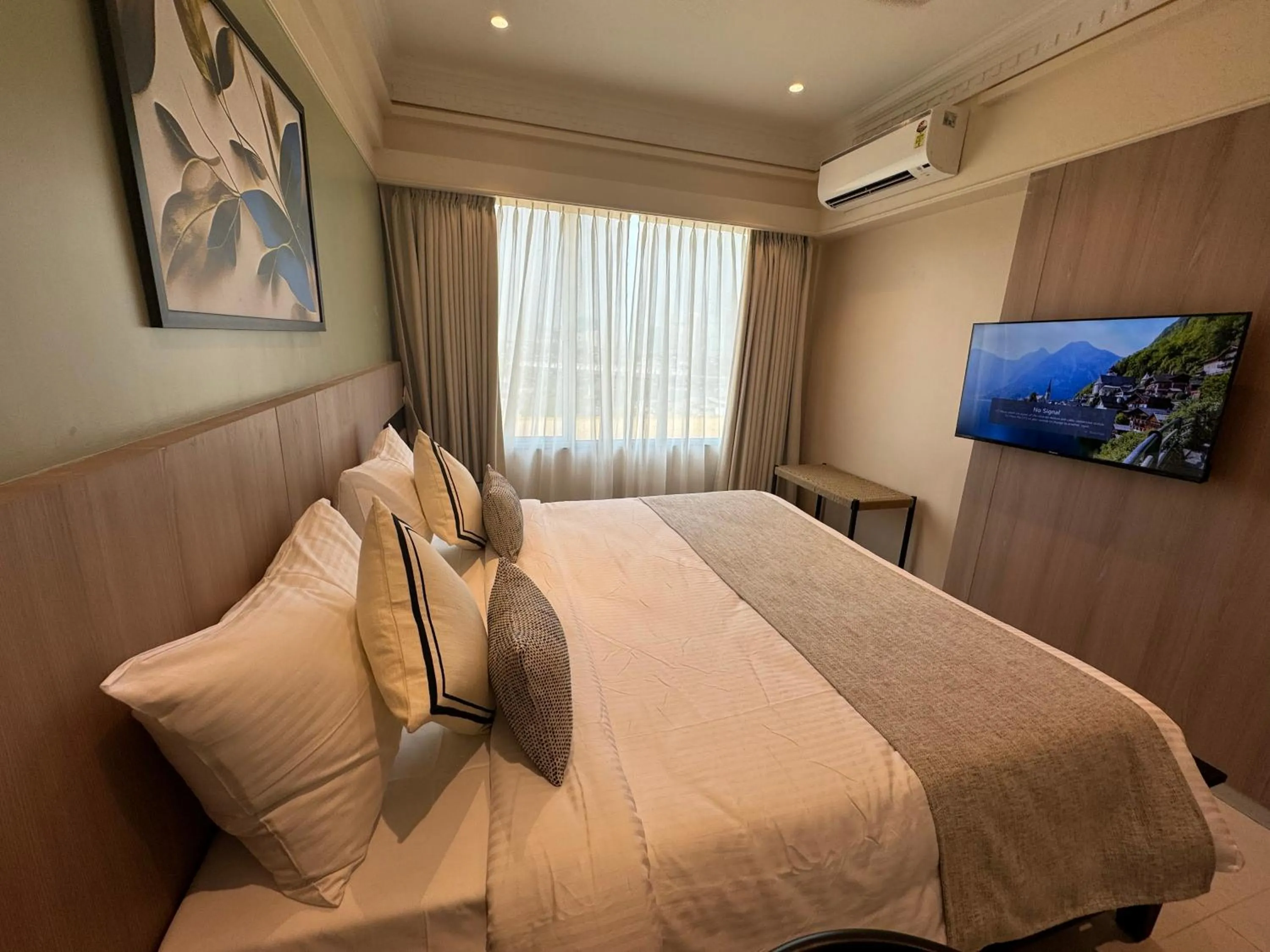 Photo of the whole room, Bed in Hotel Mumbai House, Valnai Malad