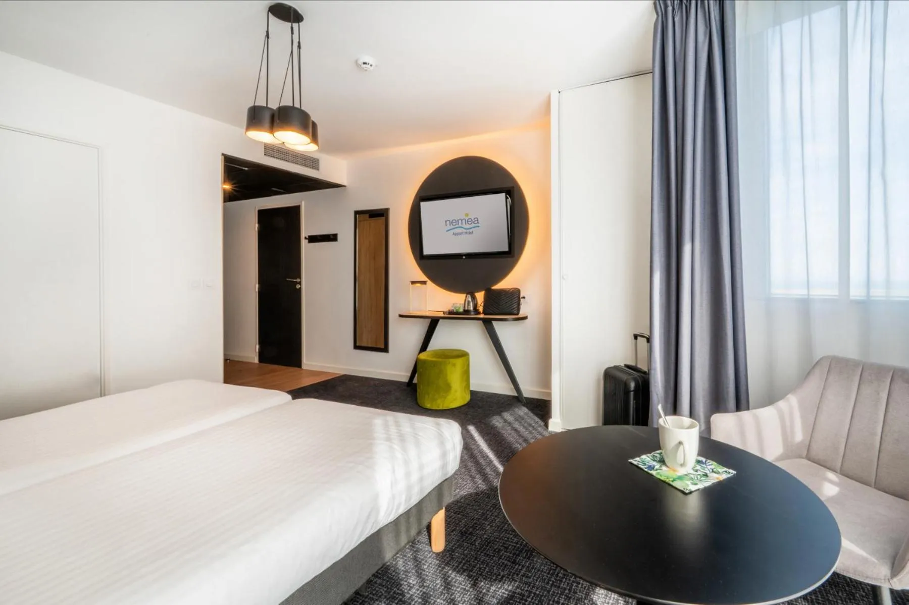 Photo of the whole room, Bed in Nemea Appart Hotel Nice Arenas Aéroport