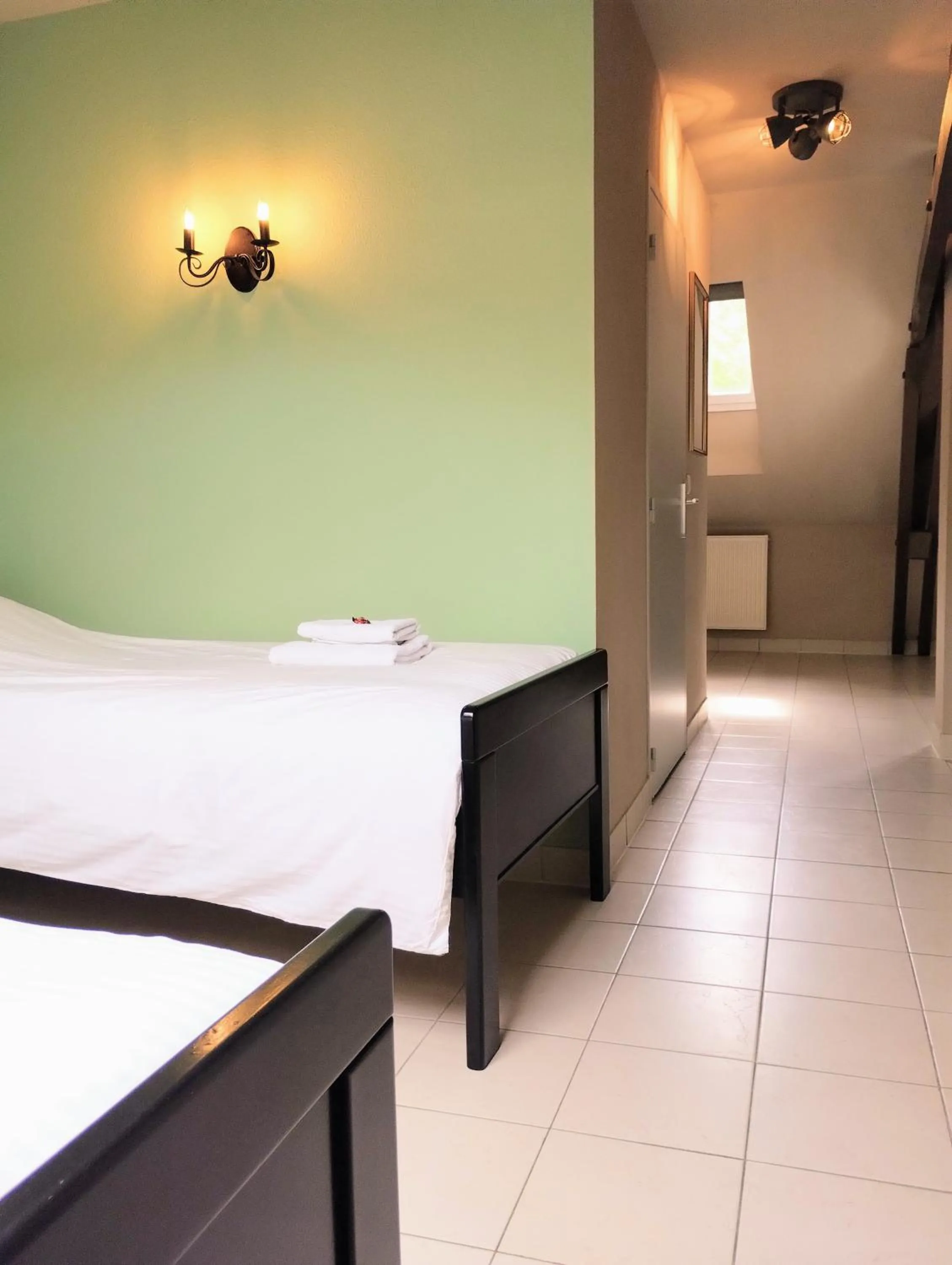 Bed in Hotel Rêve de la Vallée