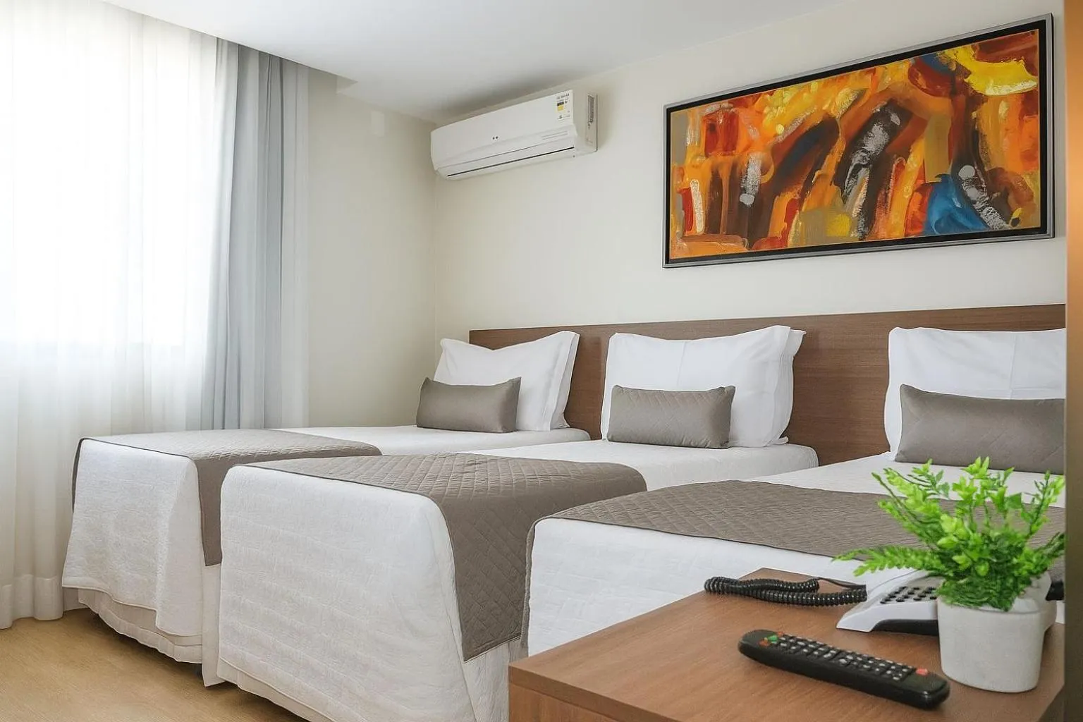 Bed in Vida Plaza Hotel