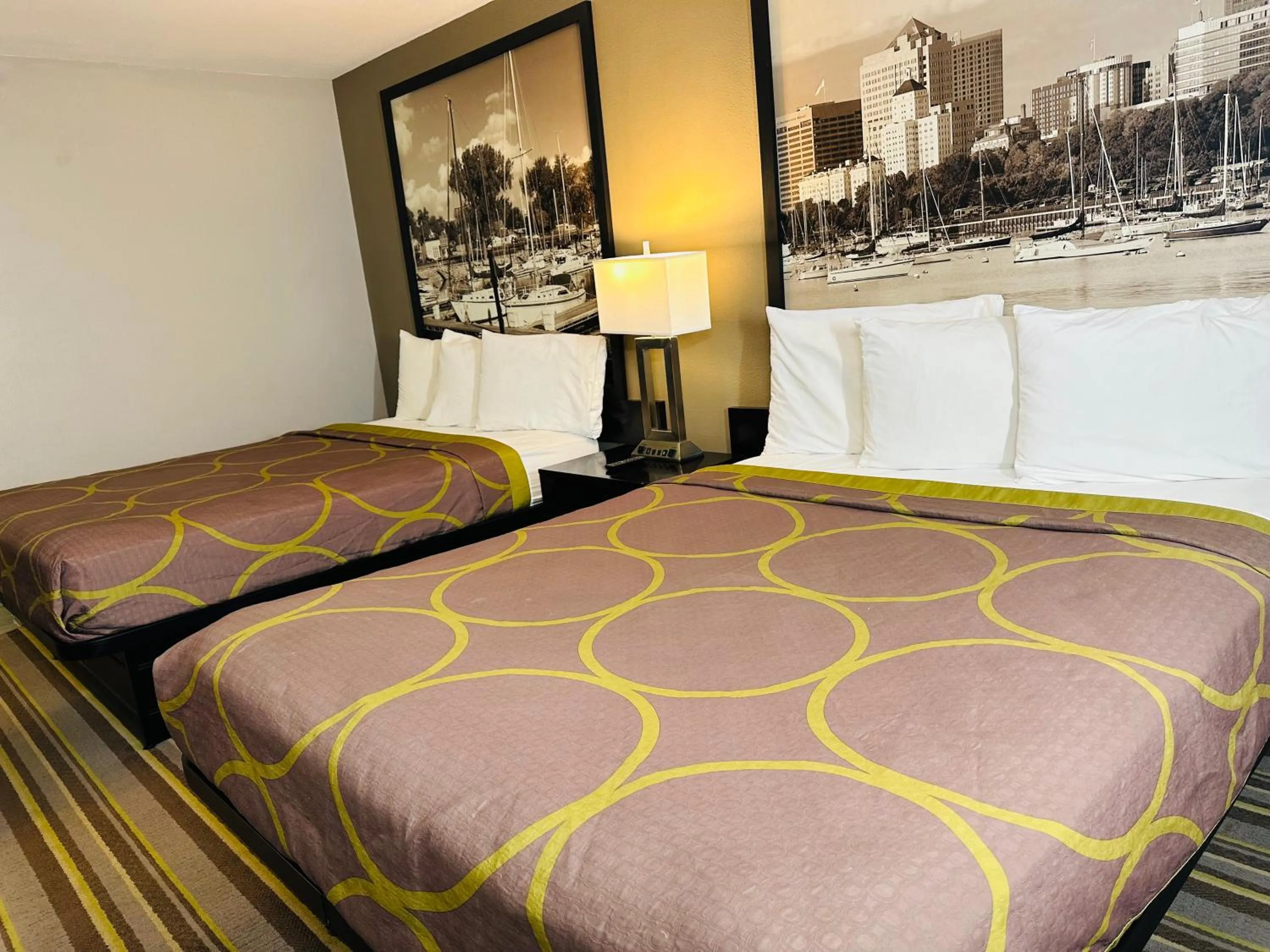 Bed in Delavan Inn and Suites