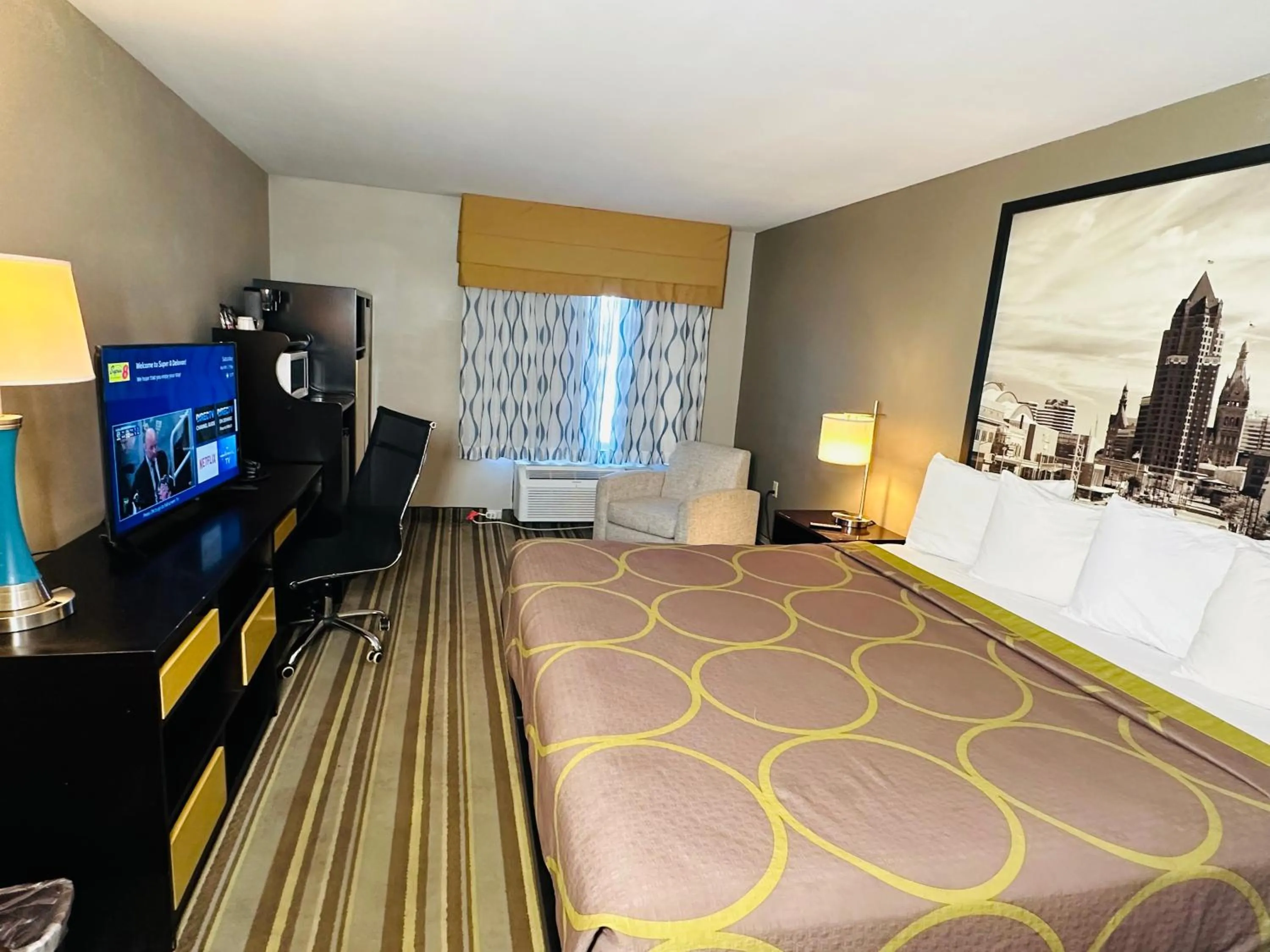 Bed in Delavan Inn and Suites