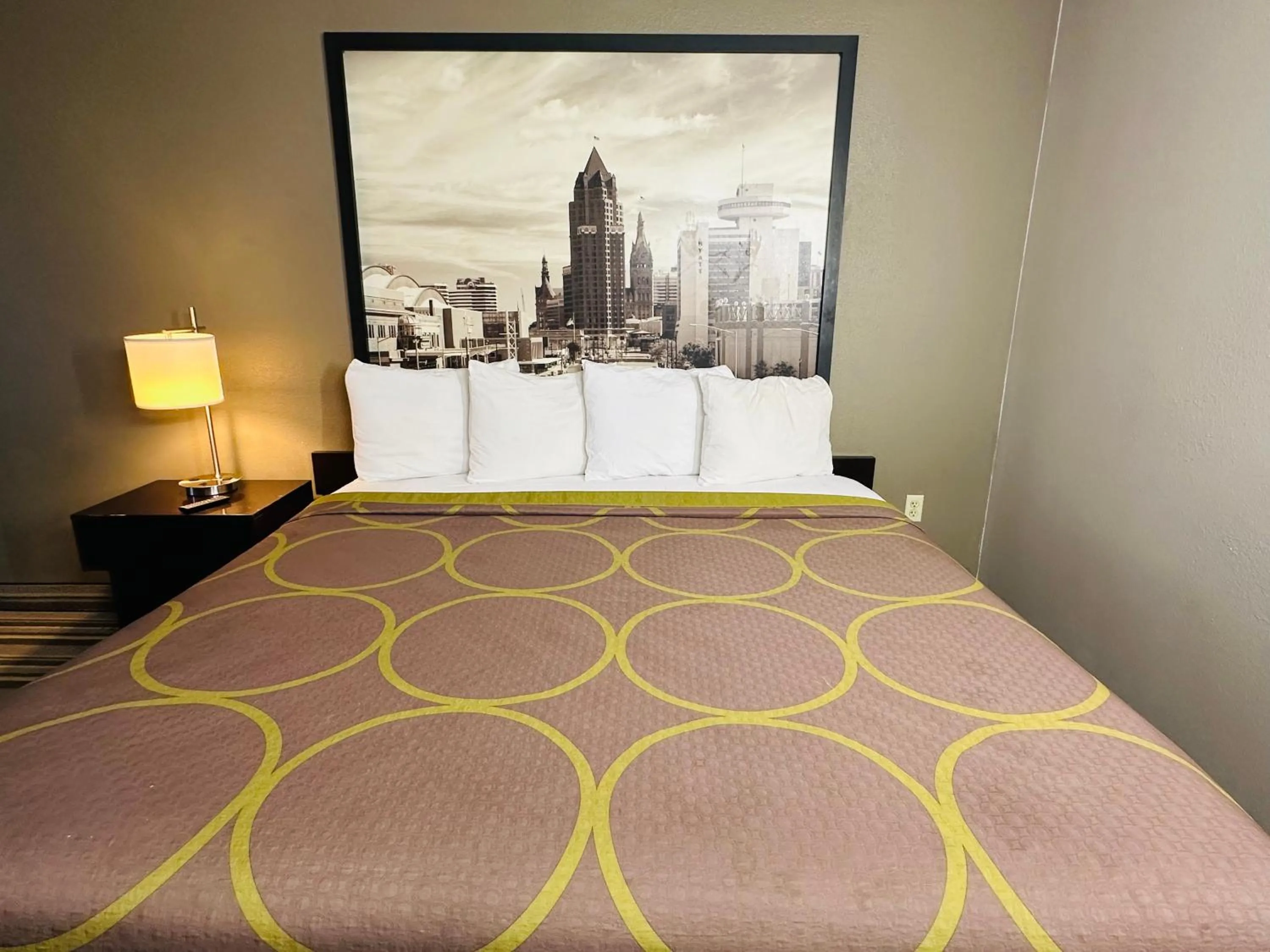 Bed in Delavan Inn and Suites