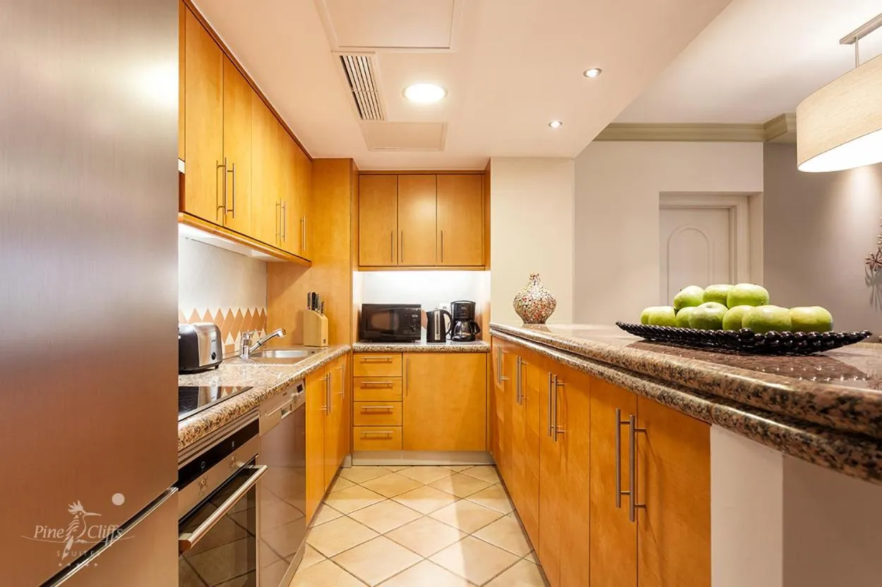 Kitchen or kitchenette in Pine Cliffs Suites