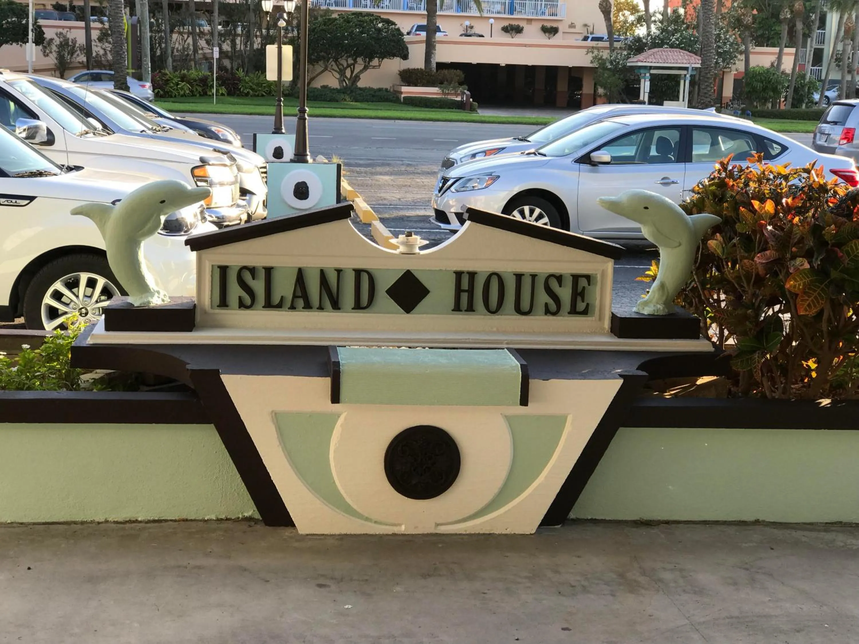 Property logo or sign in Island House Resort Hotel