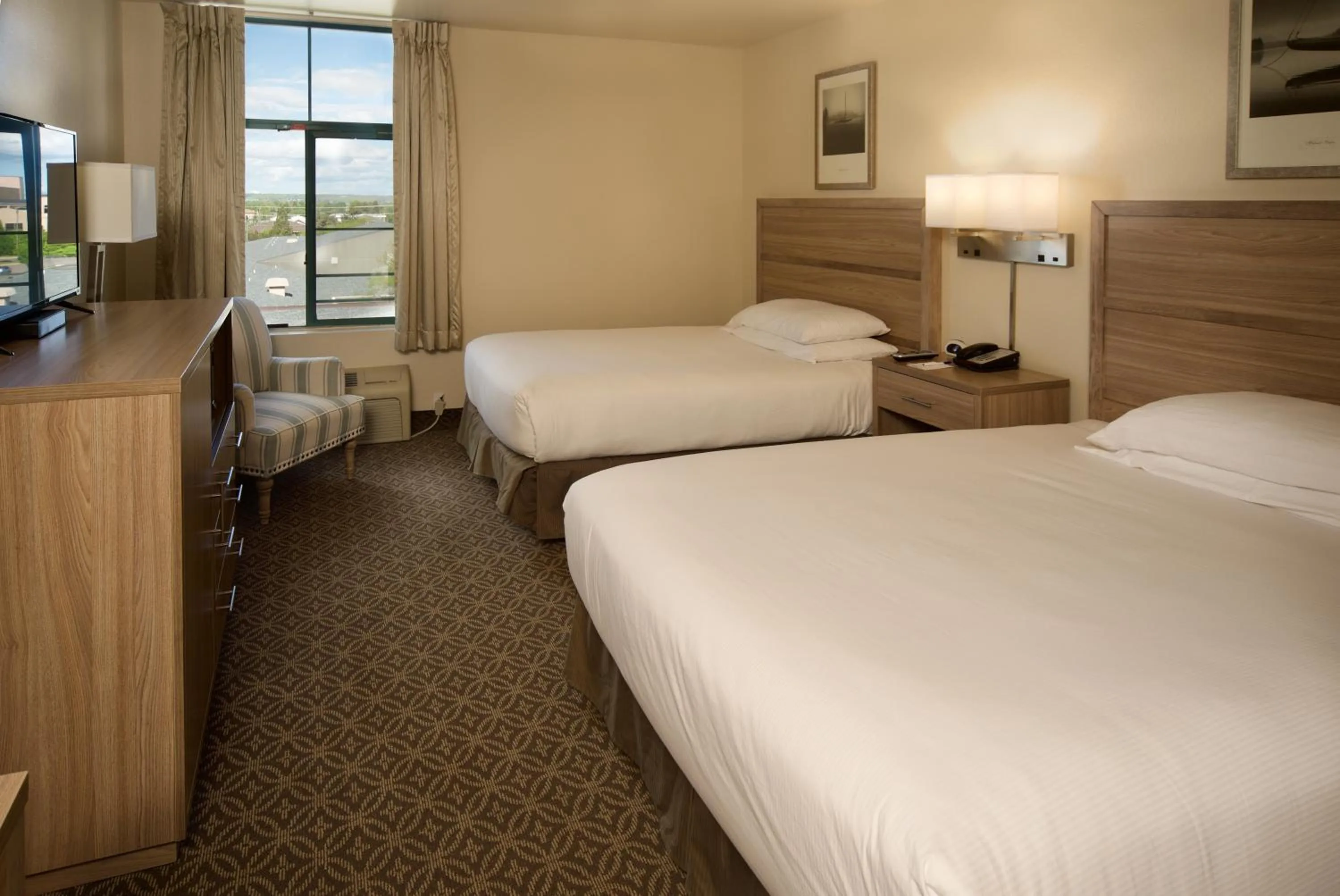 Bed in The Great Falls Inn By Riversage