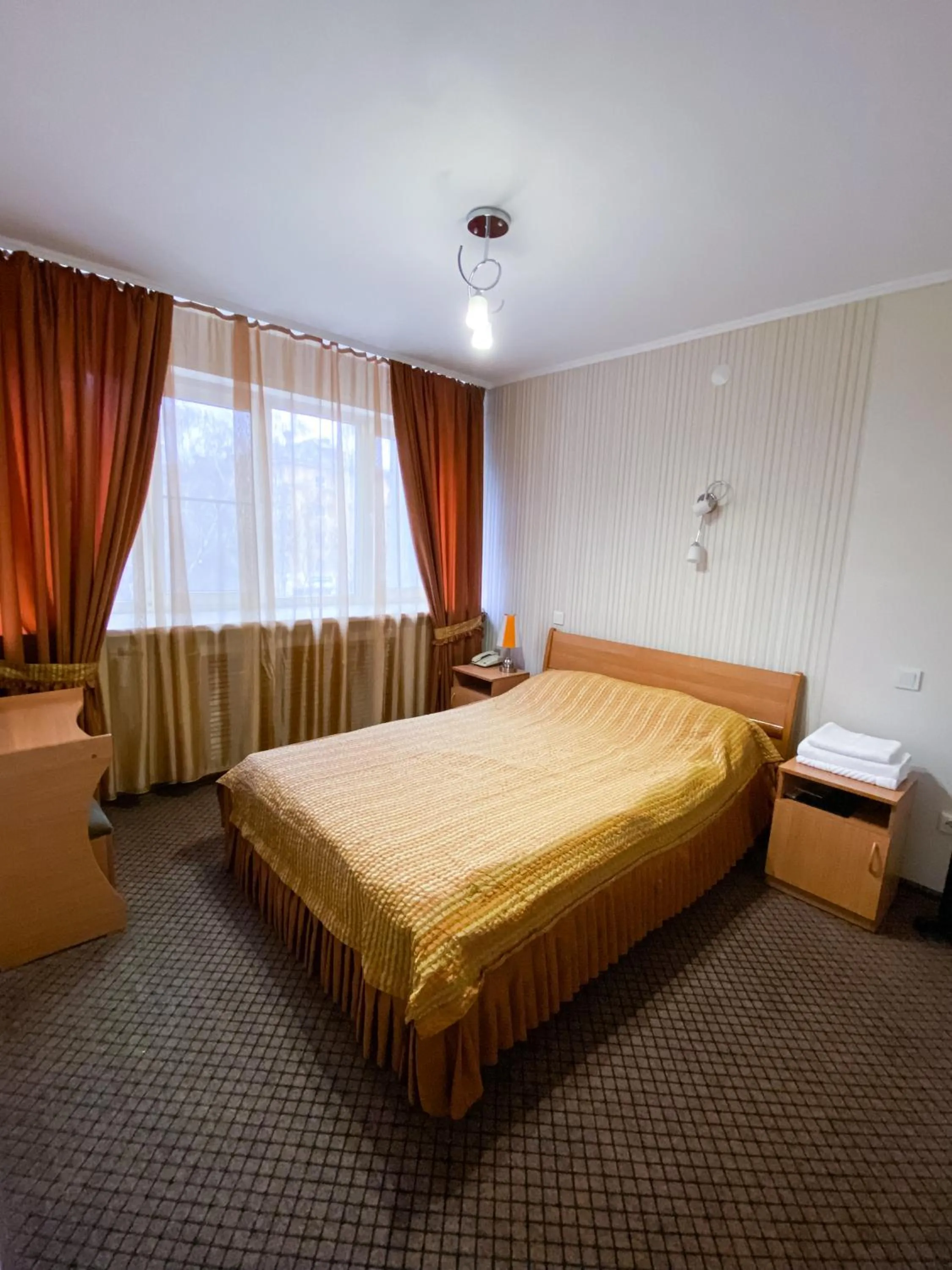 Bed in Ust-Kamenogorsk Hotel