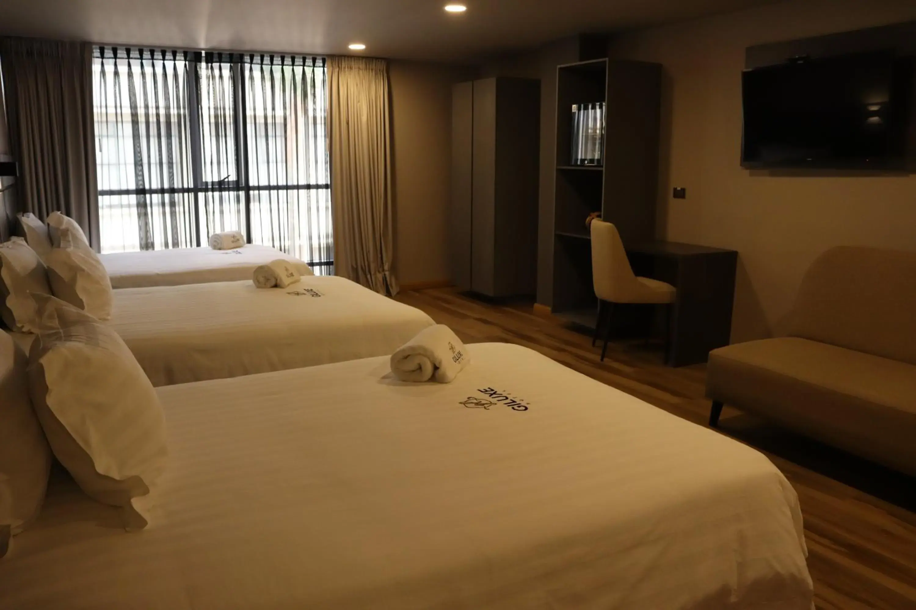 Triple Room in Giluxe Hotel Triple Room in Giluxe Hotel