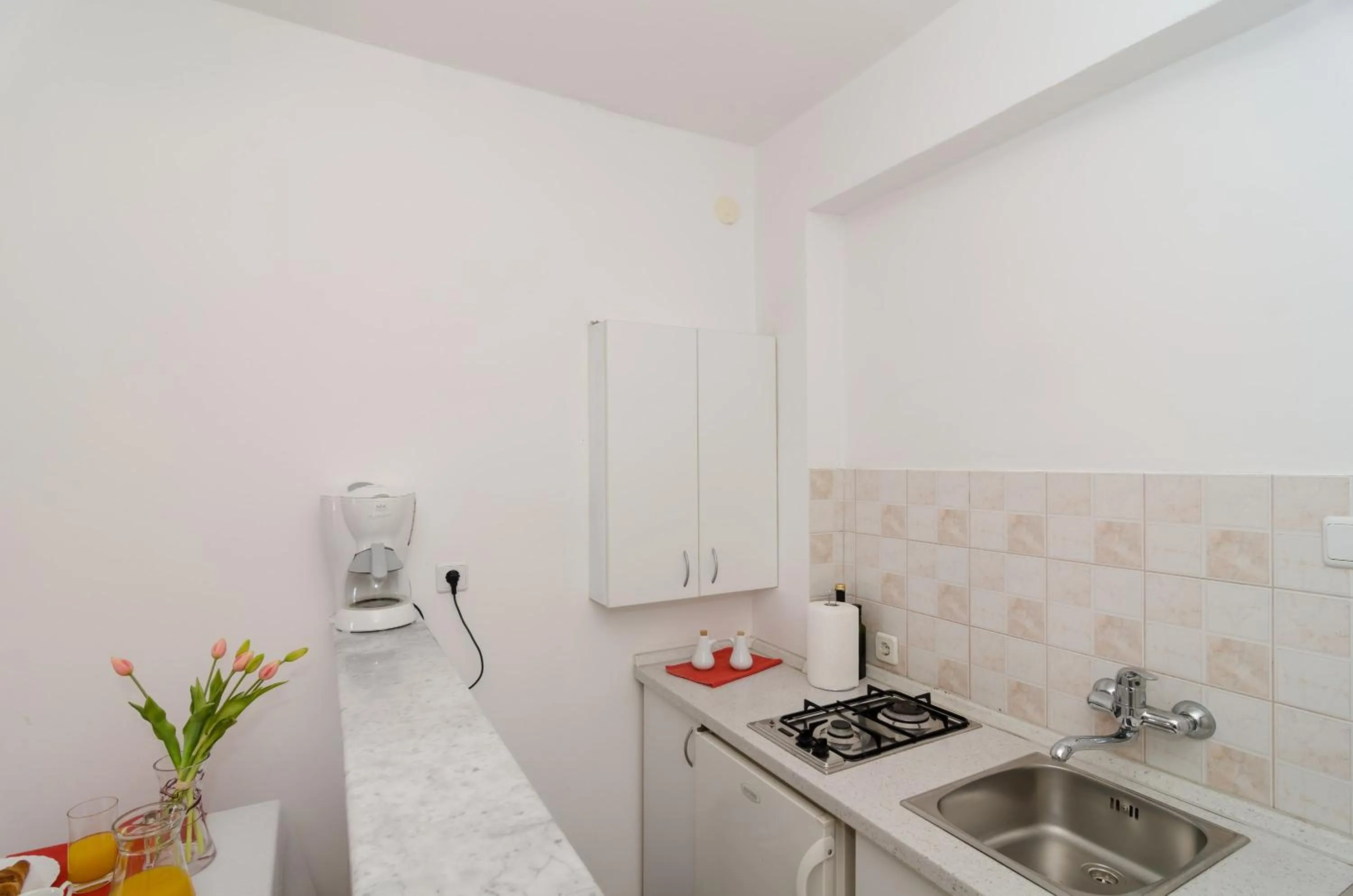 Kitchen or kitchenette in Guesthouse Home Sweet Home