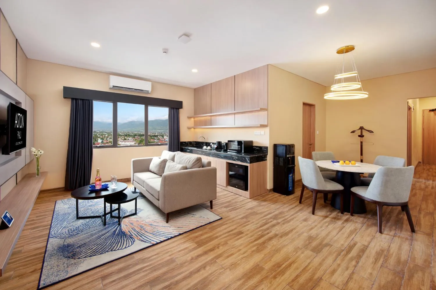 Living room in Aston Palu Hotel & Conference Center