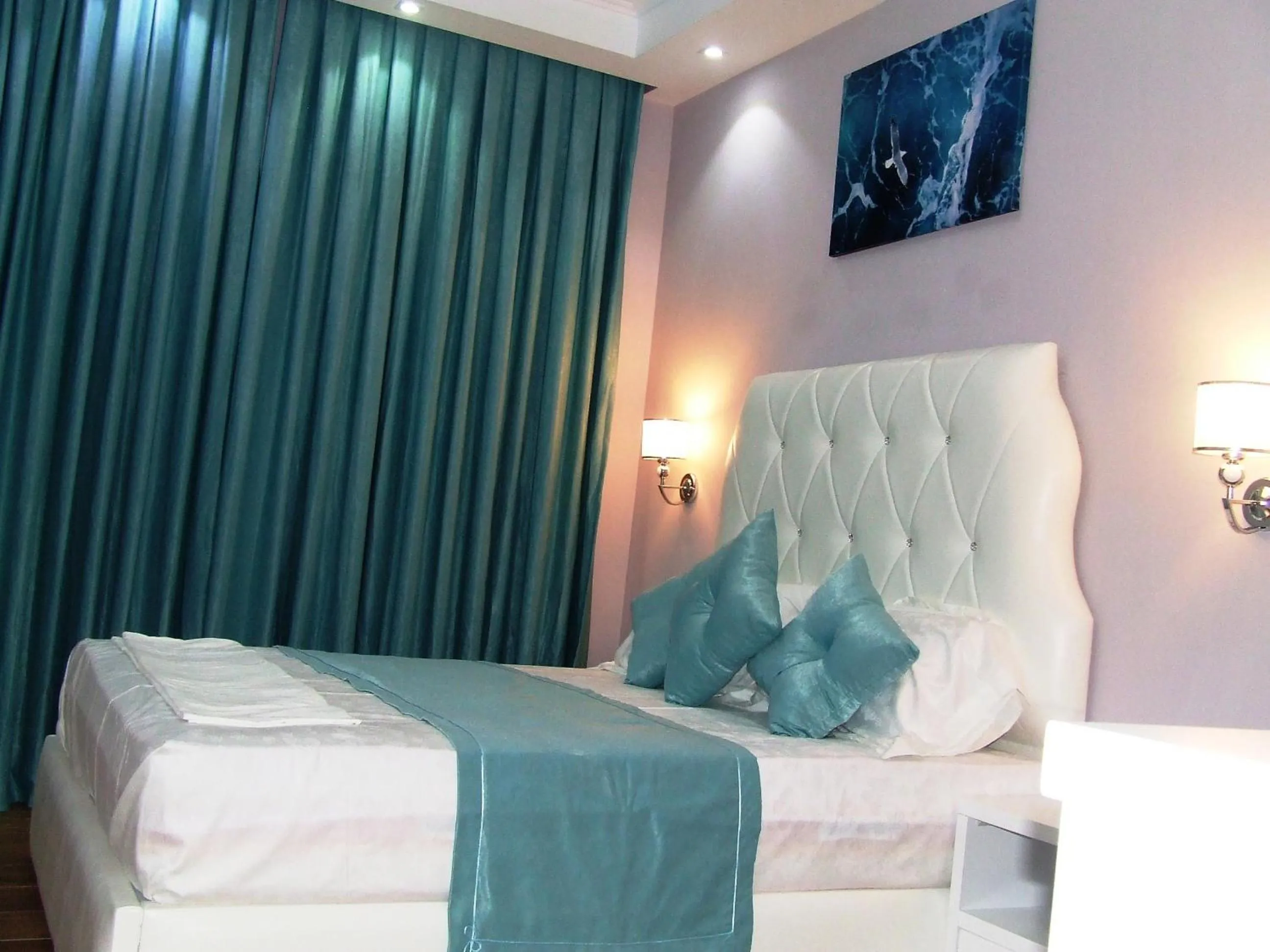 Bedroom in Apartments Flower Residence