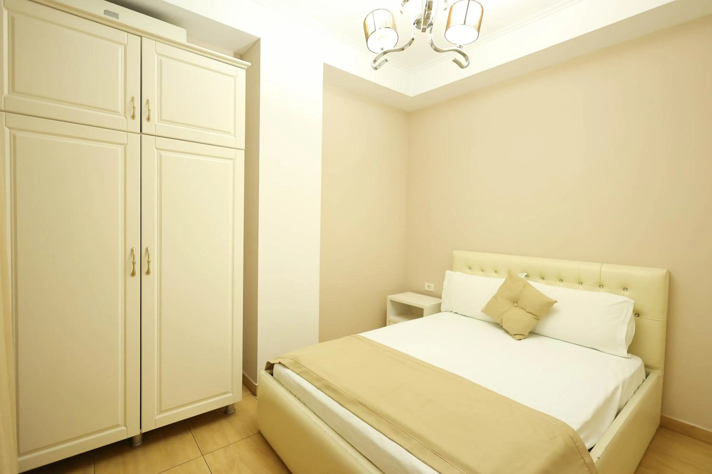 Bed in Apartments Flower Residence