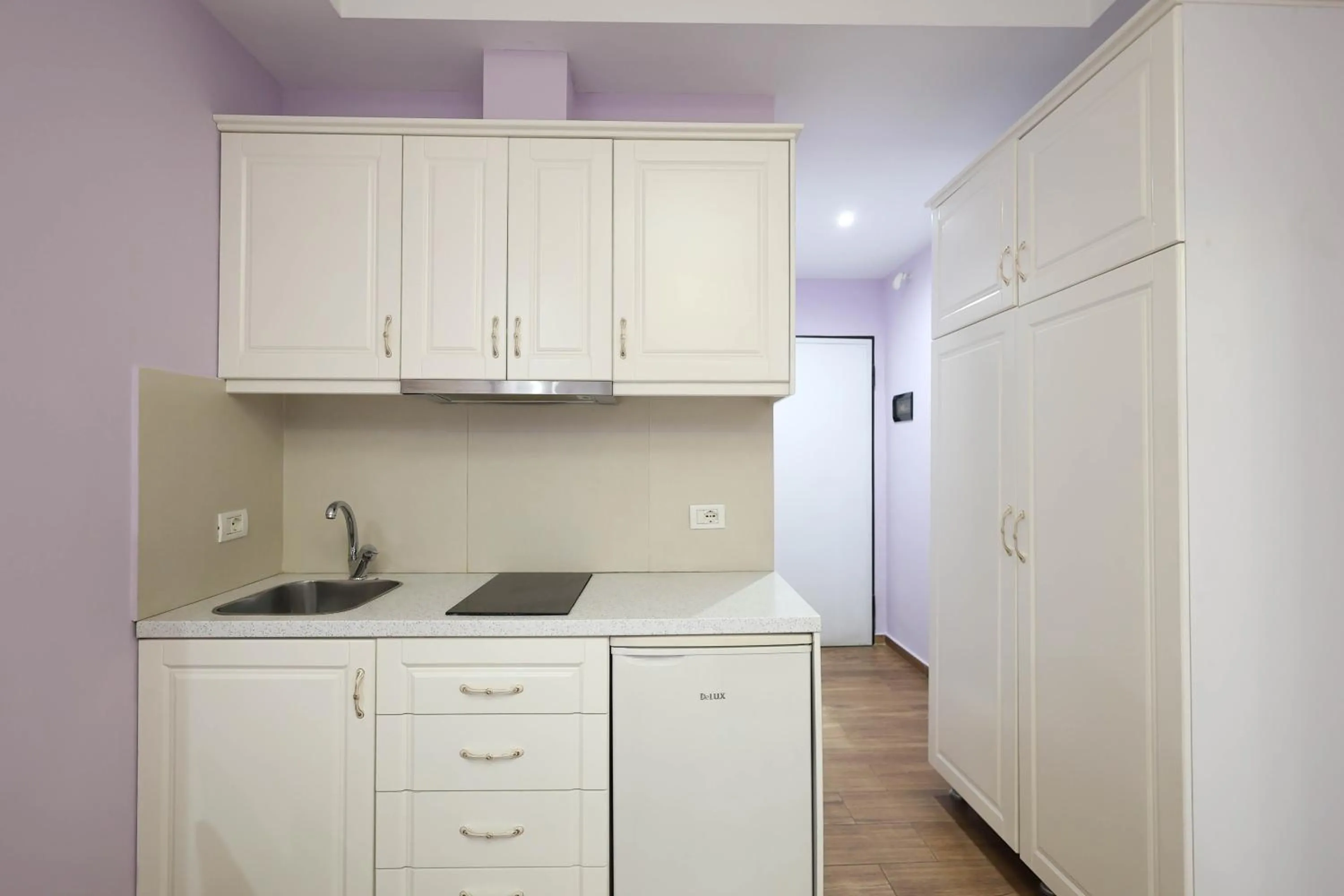 Kitchen or kitchenette in Apartments Flower Residence