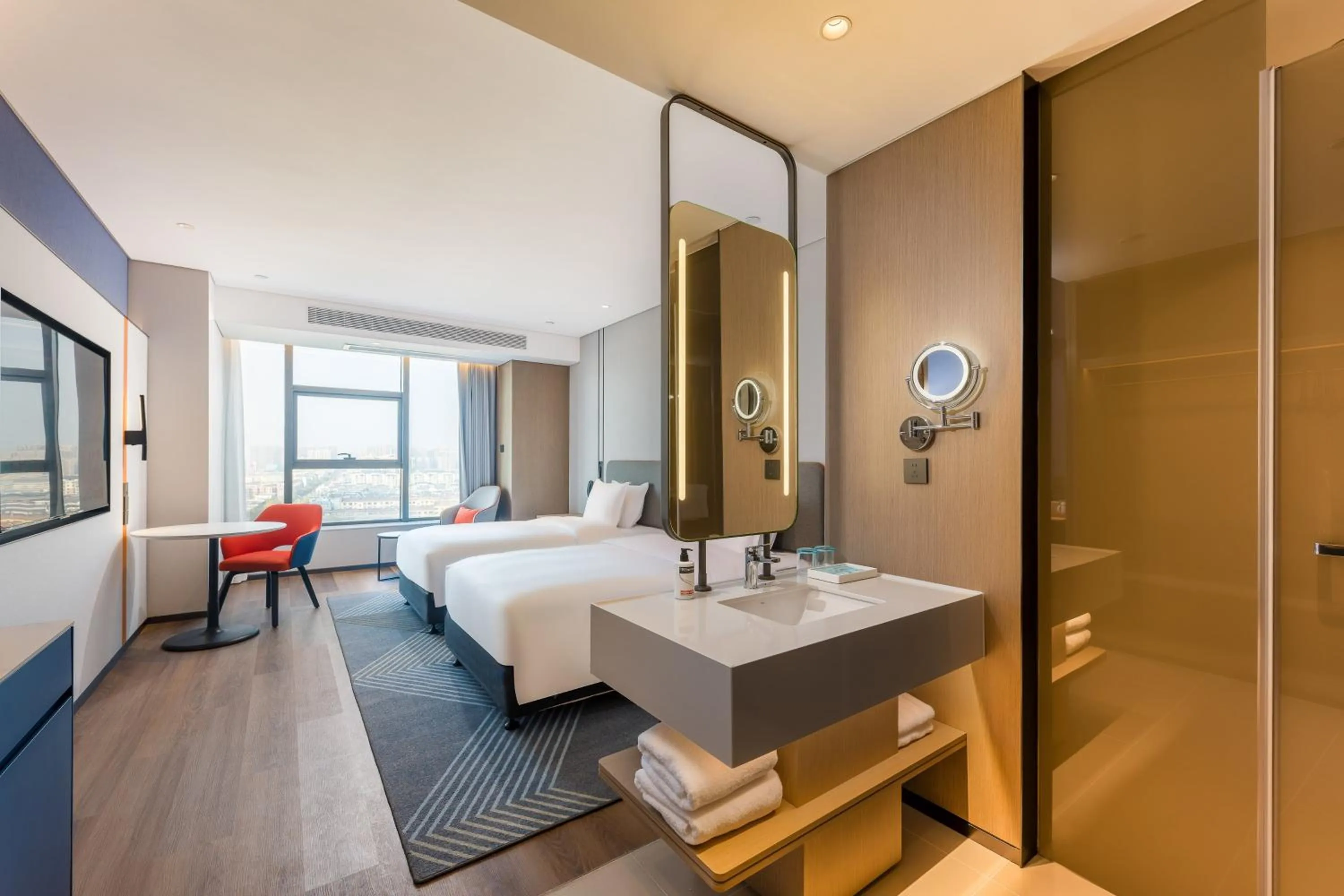 Photo of the whole room, Seating Area in Holiday Inn Express Heze City Center, an IHG Hotel