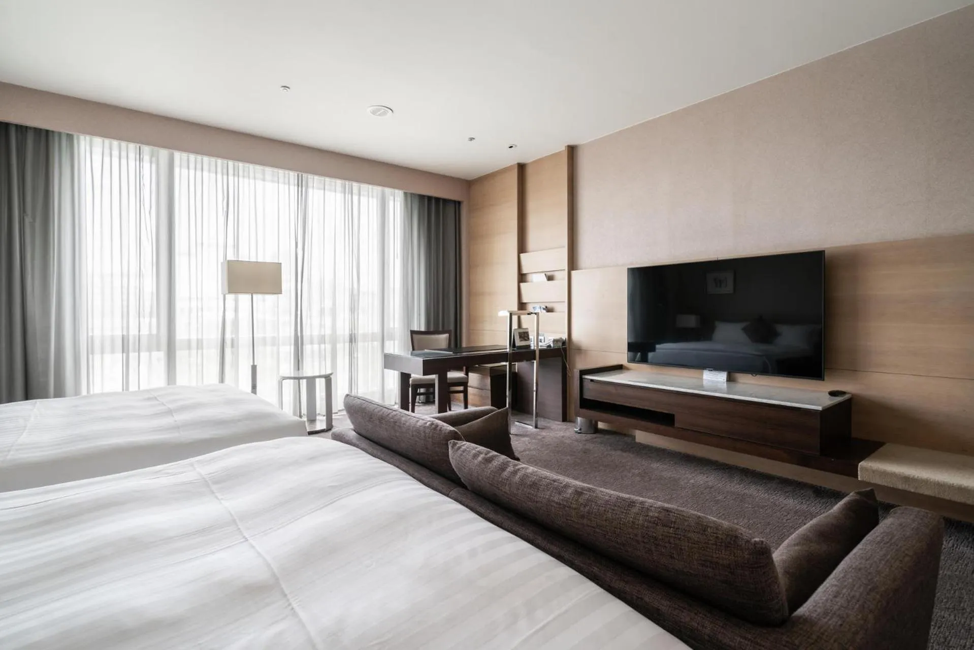 Bed in Taipung Suites