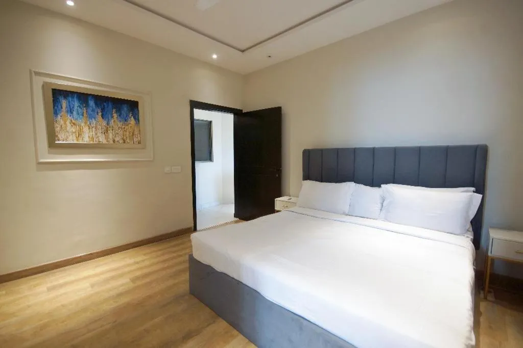 Bed in The Opus Luxury Residences