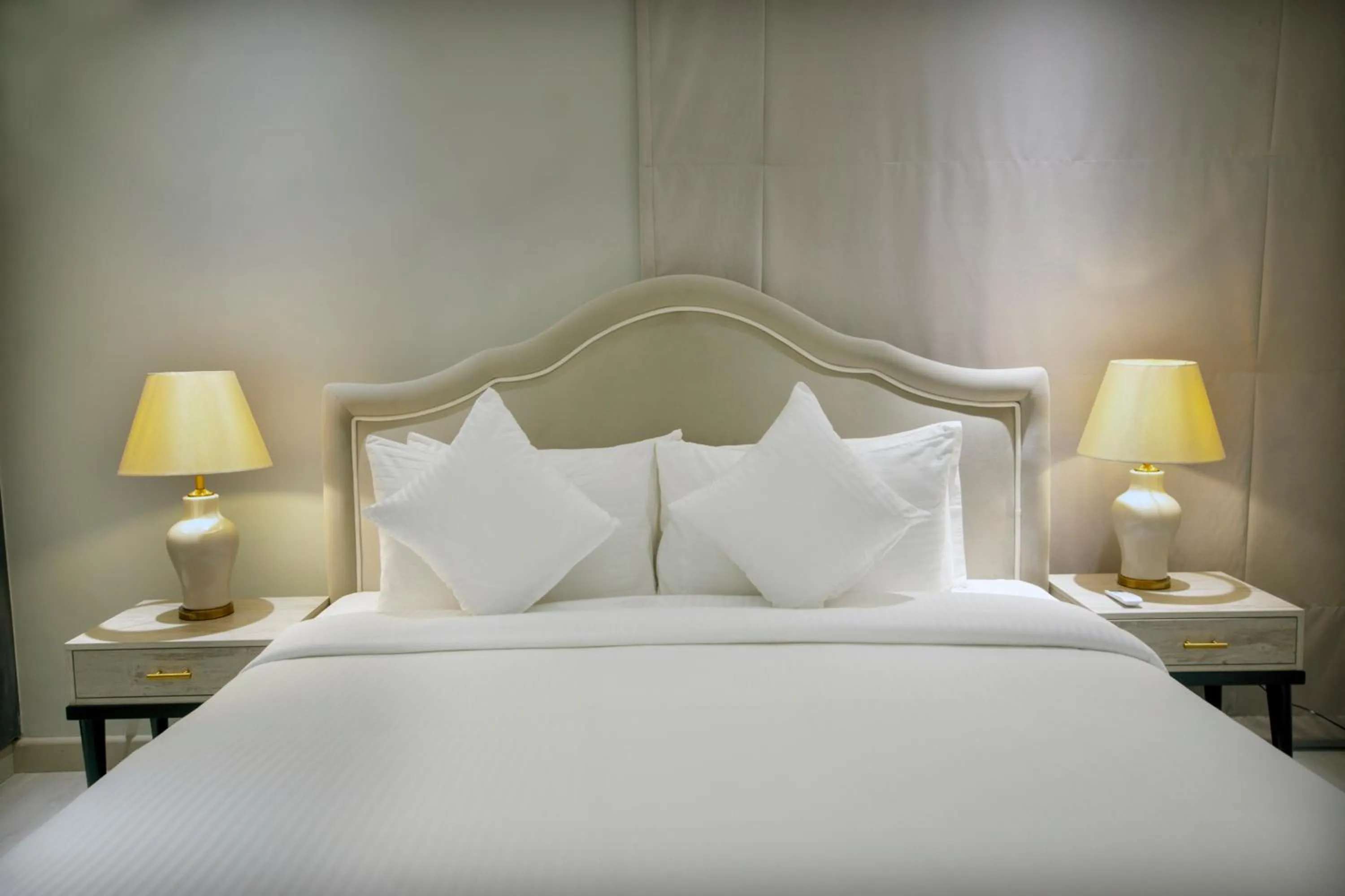 Bed in The Opus Luxury Residences