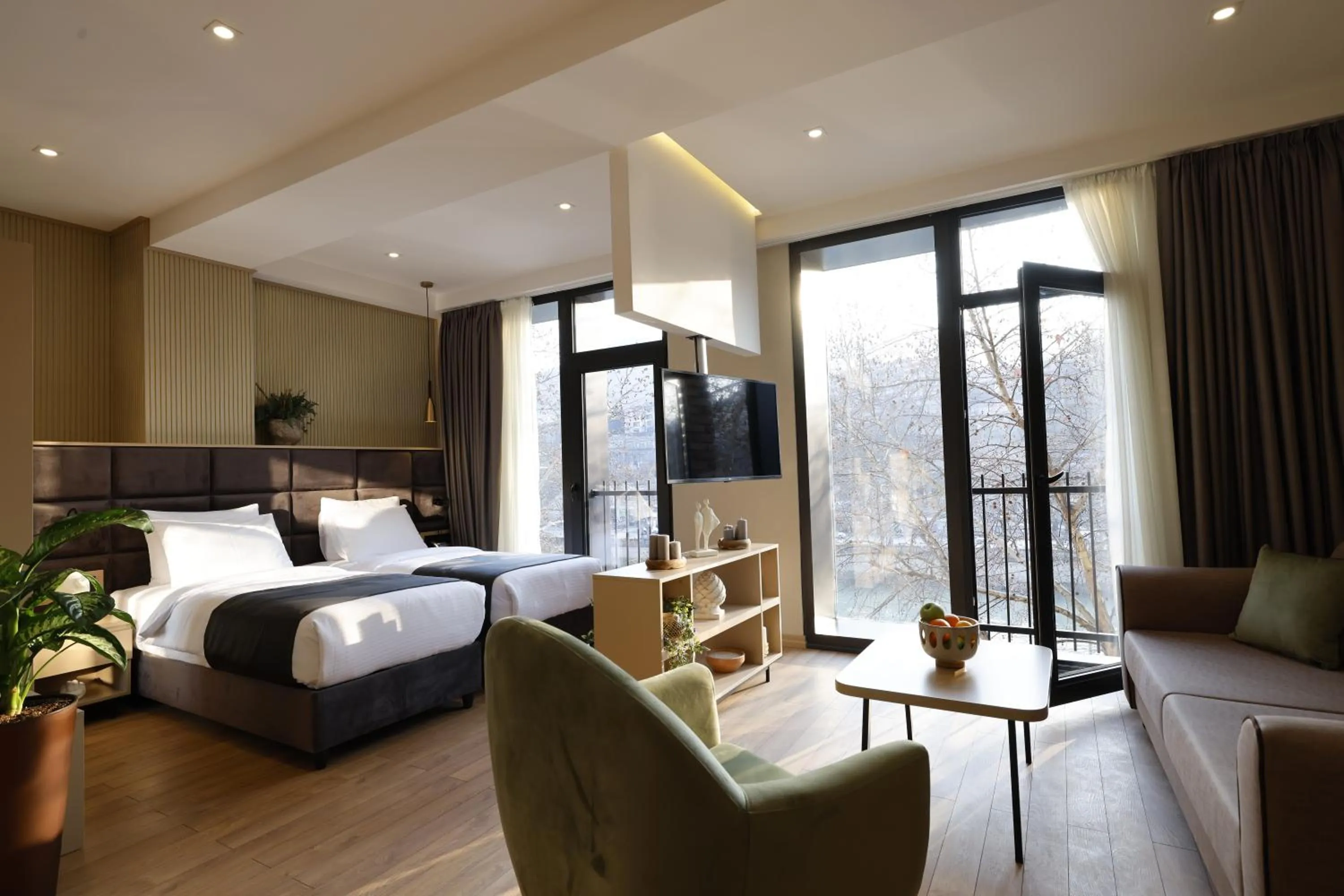 Living room, Bed in Hotel Monday by DNT Group