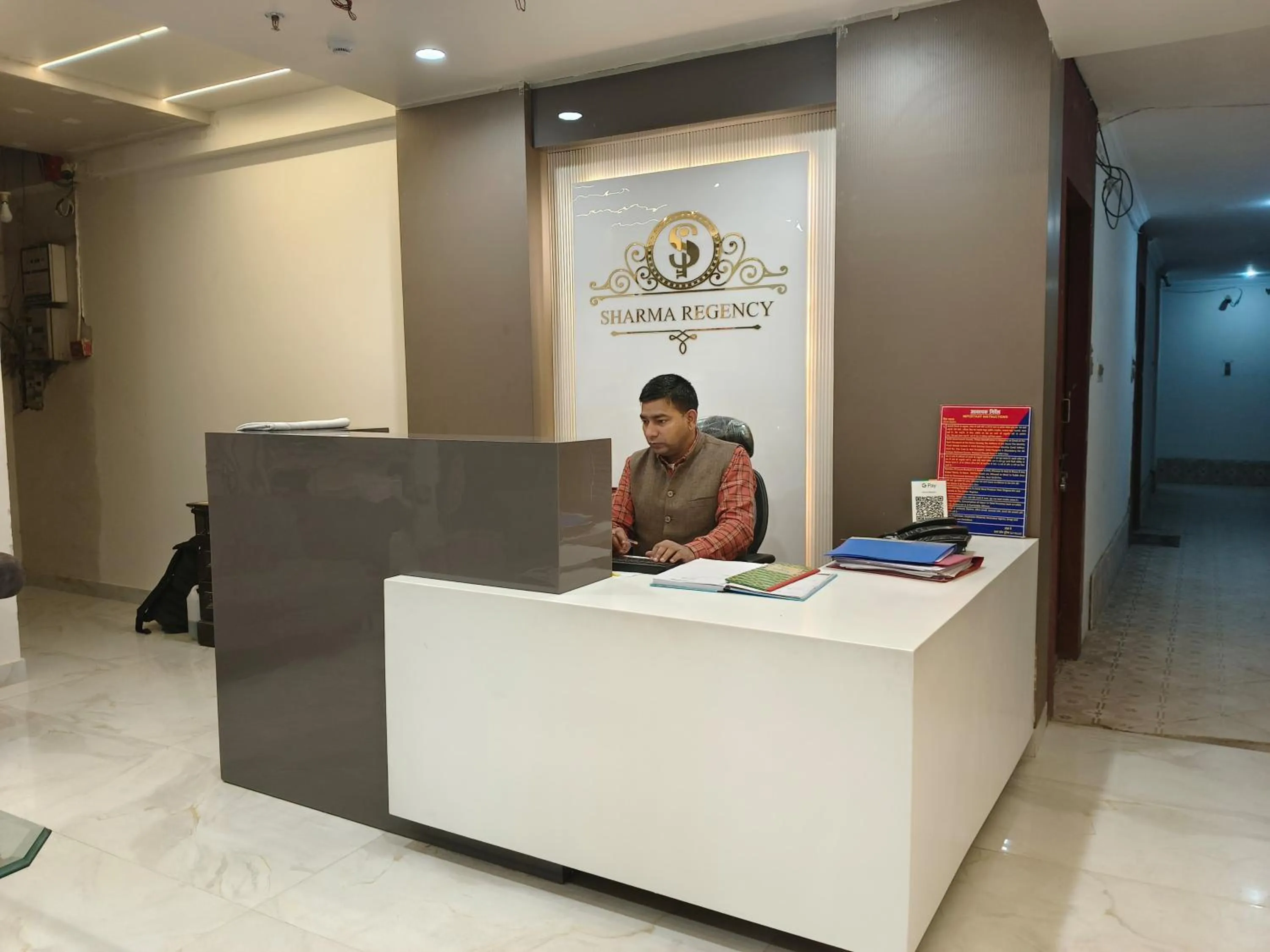 Property logo or sign in Hotel Sharma Regency