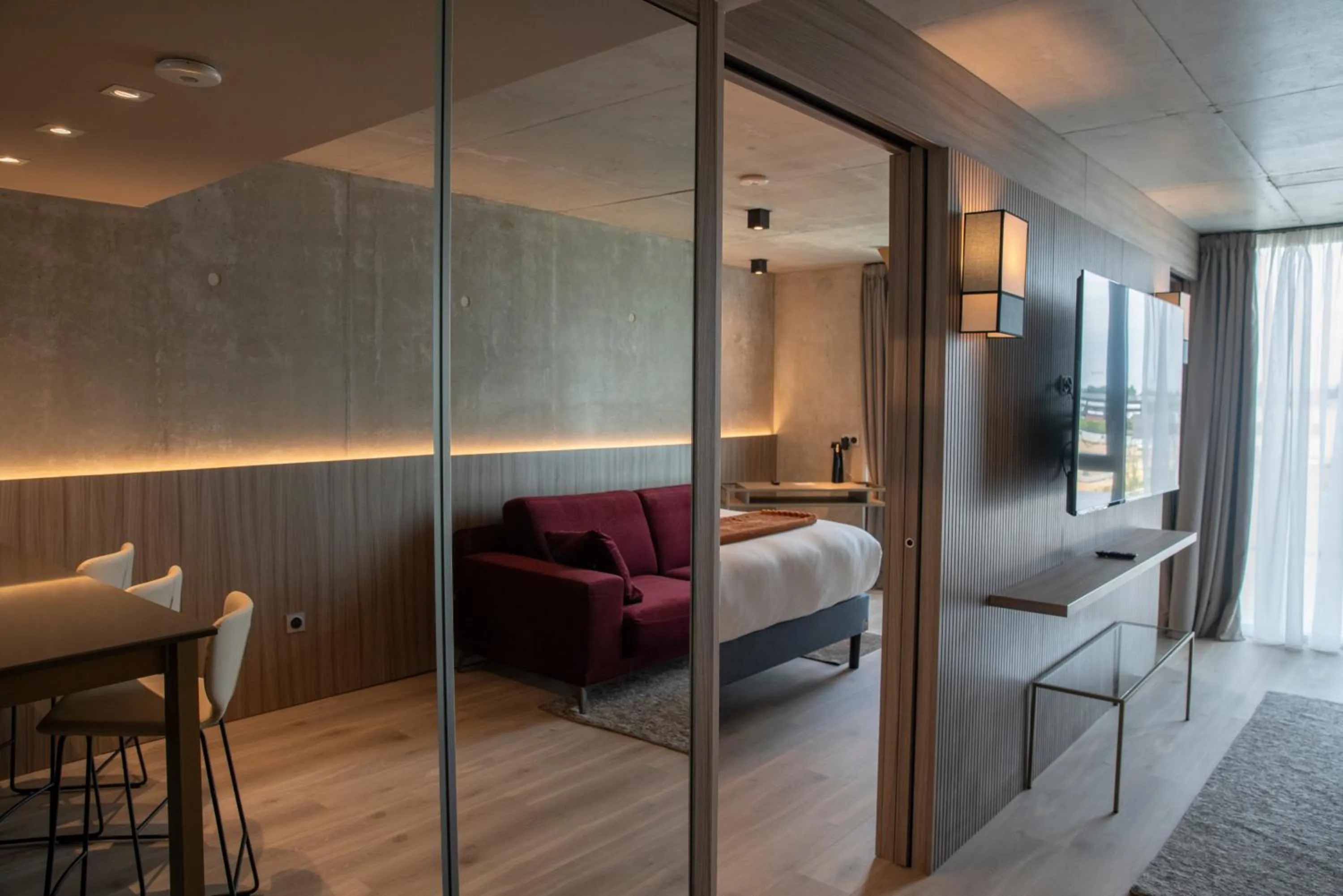 Communal lounge/ TV room, Bed in Ki Space Hotel & Spa - near Disneyland Paris