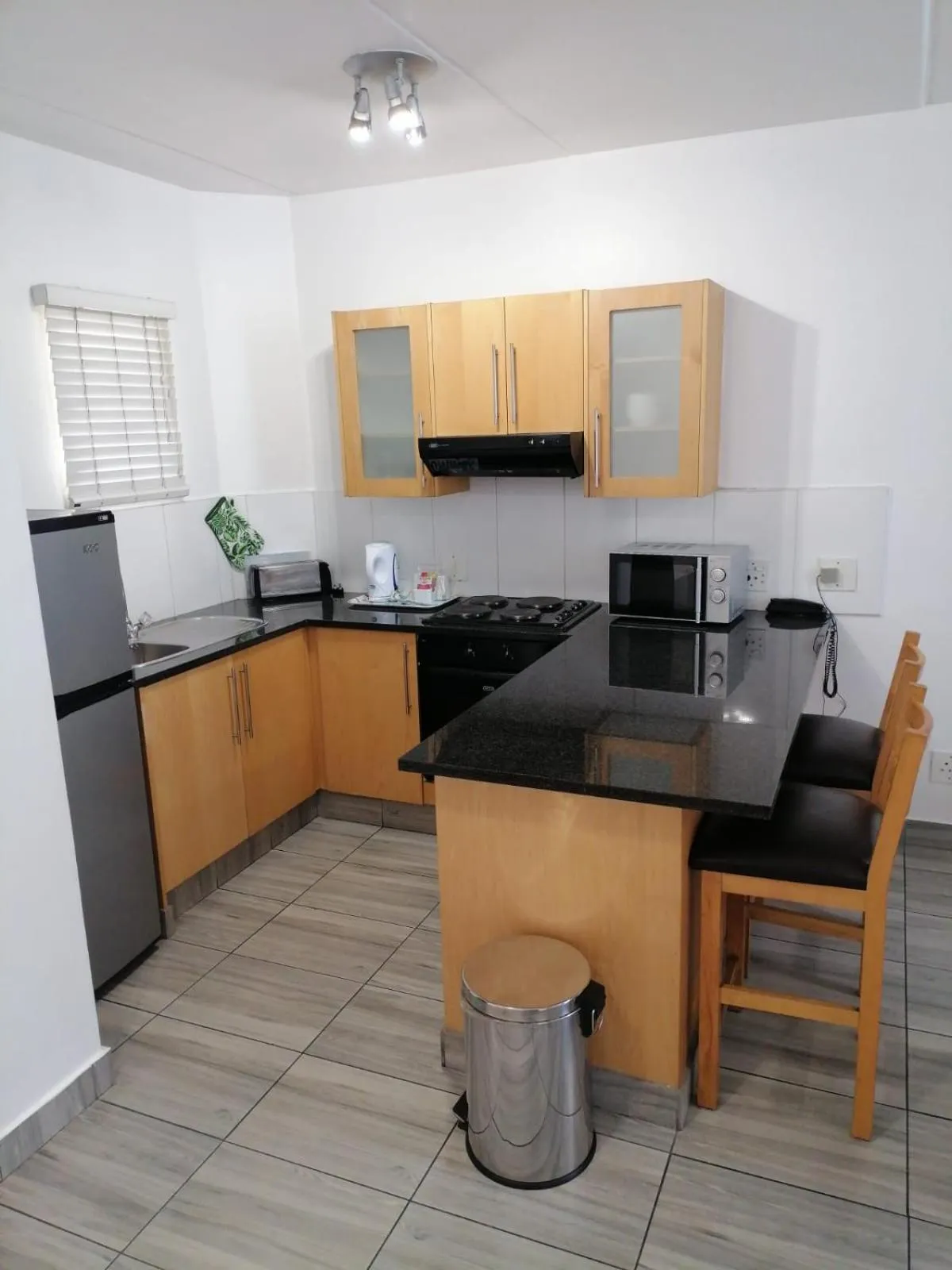 stove in Airport Inn and Suites