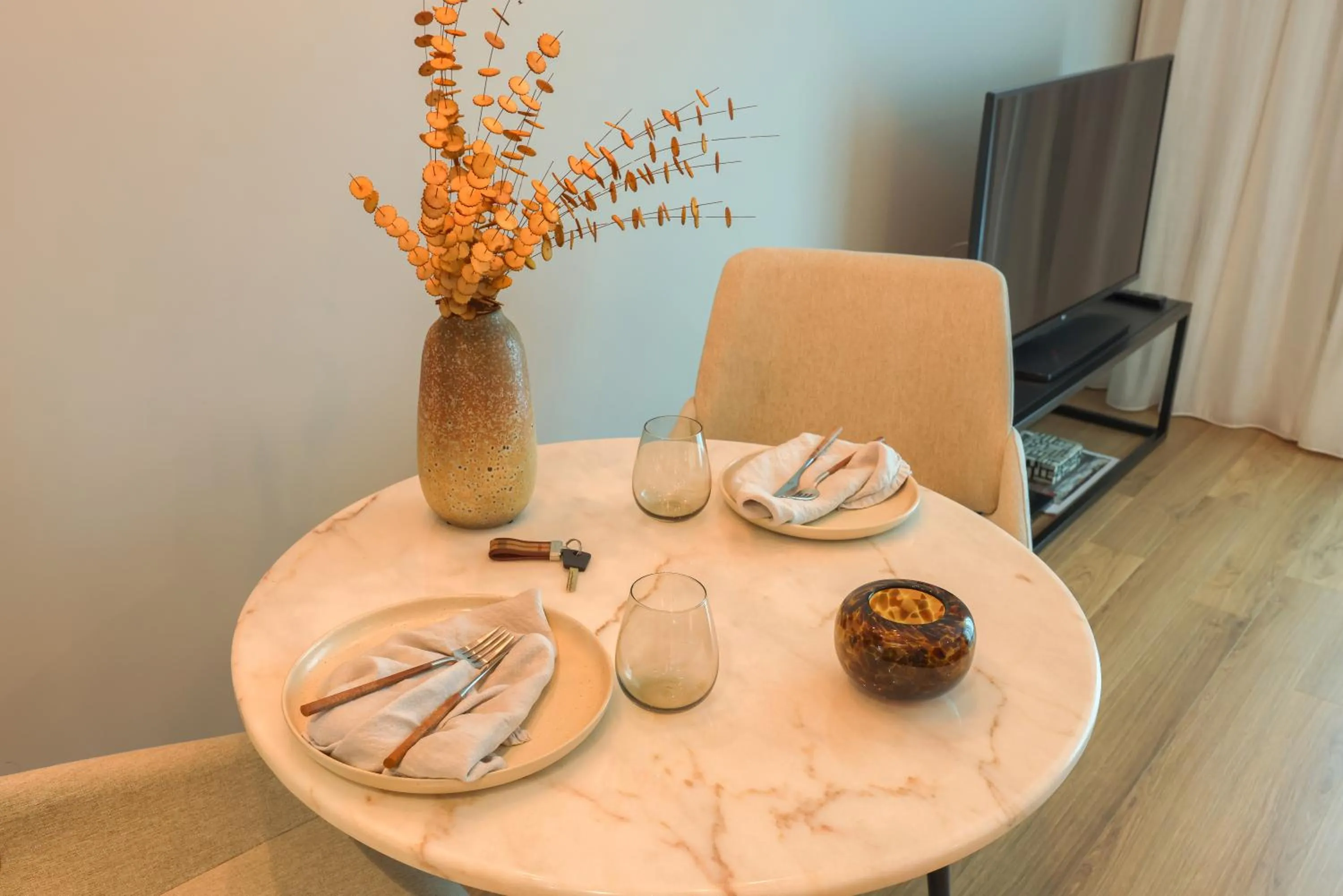 Dining area in Nôma Living Icon Apartments