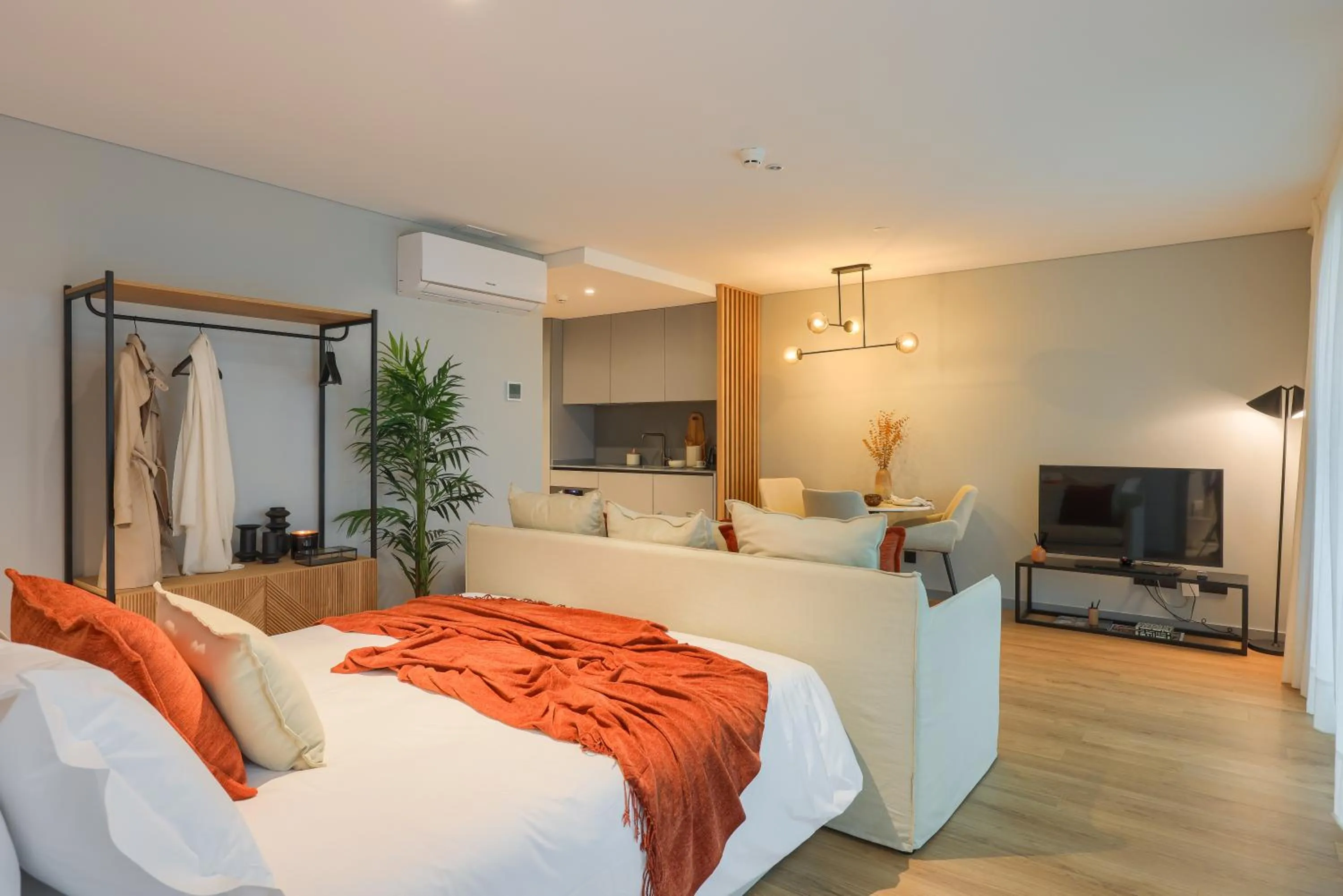 Communal lounge/ TV room, Bed in Nôma Living Icon Apartments