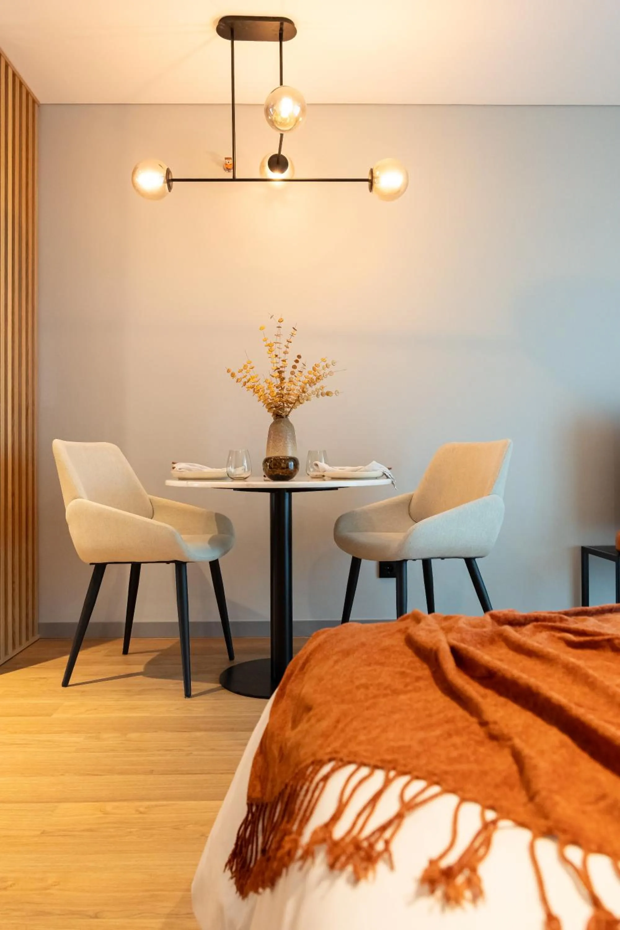 Dining area in Nôma Living Icon Apartments