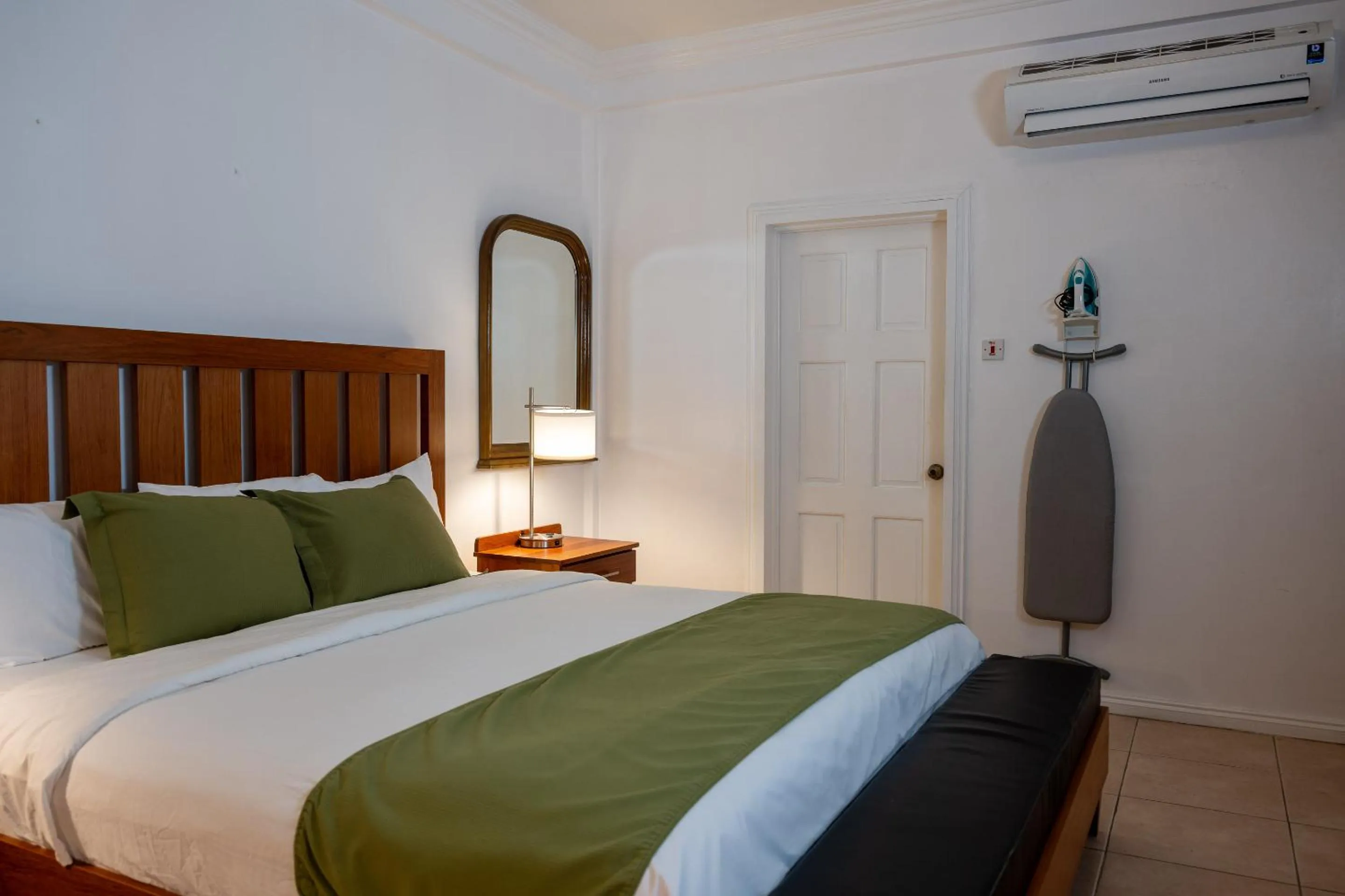 Bed in Grand Coastal Hotel