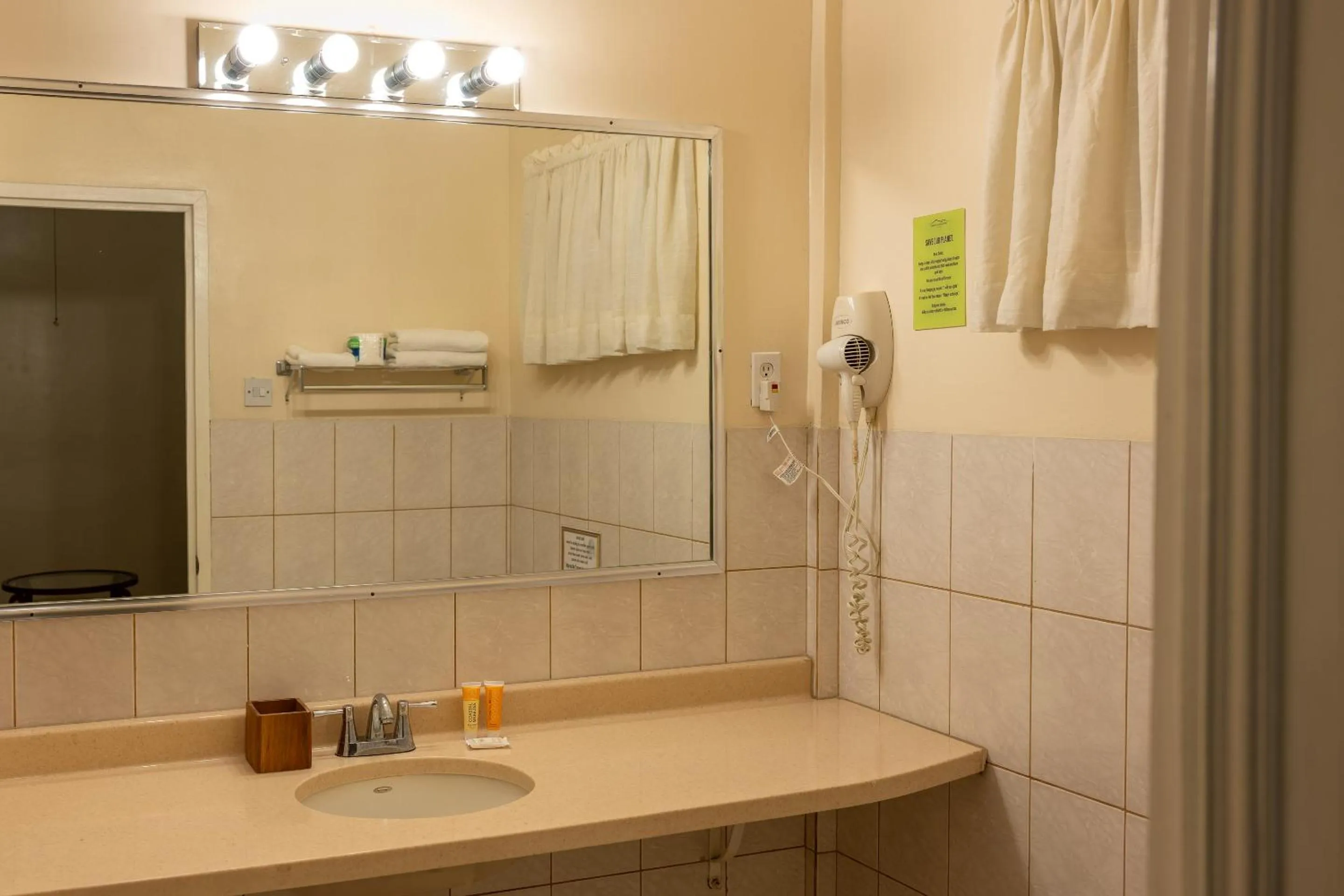 Shower in Grand Coastal Hotel