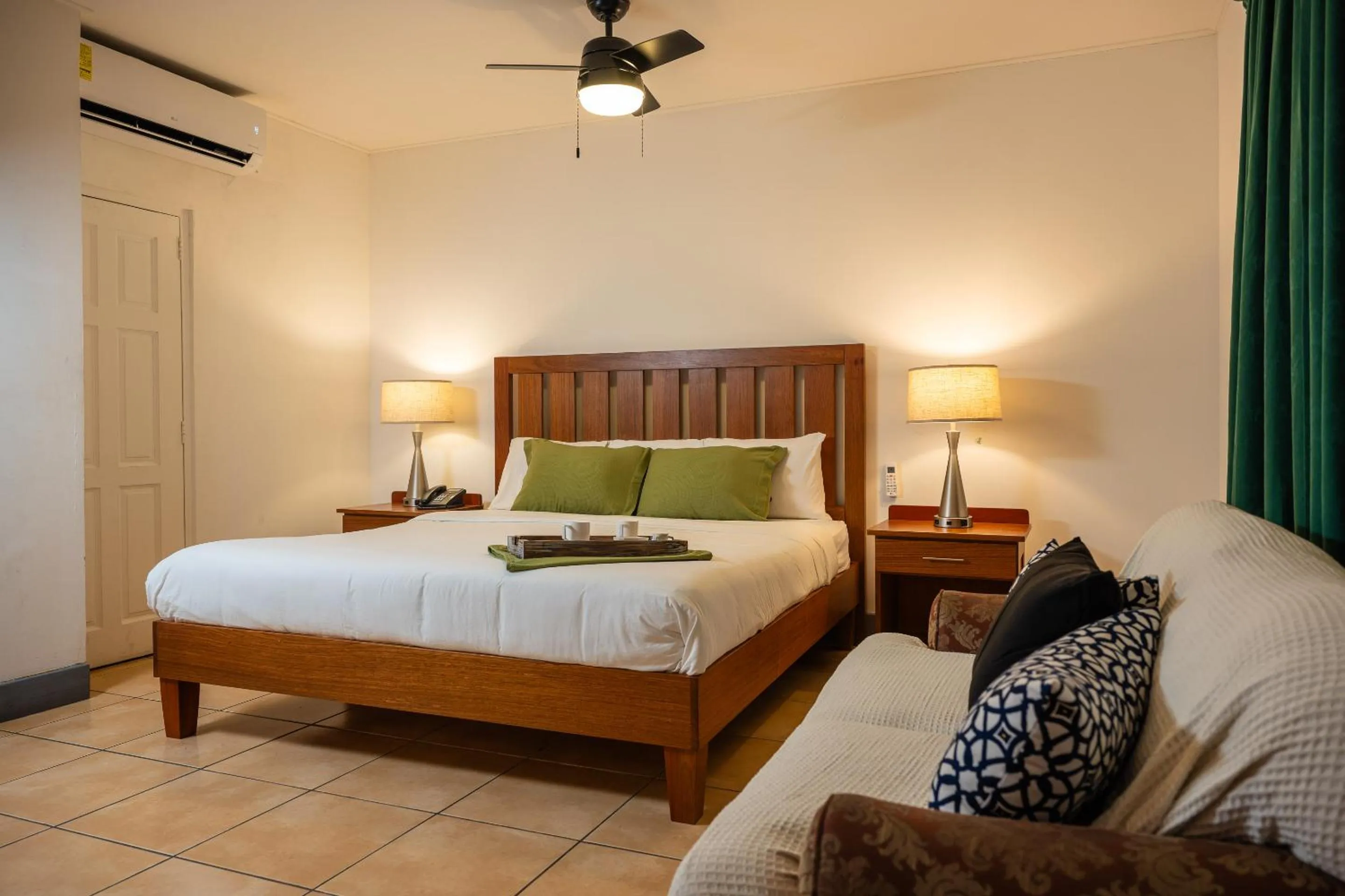 Bed in Grand Coastal Hotel