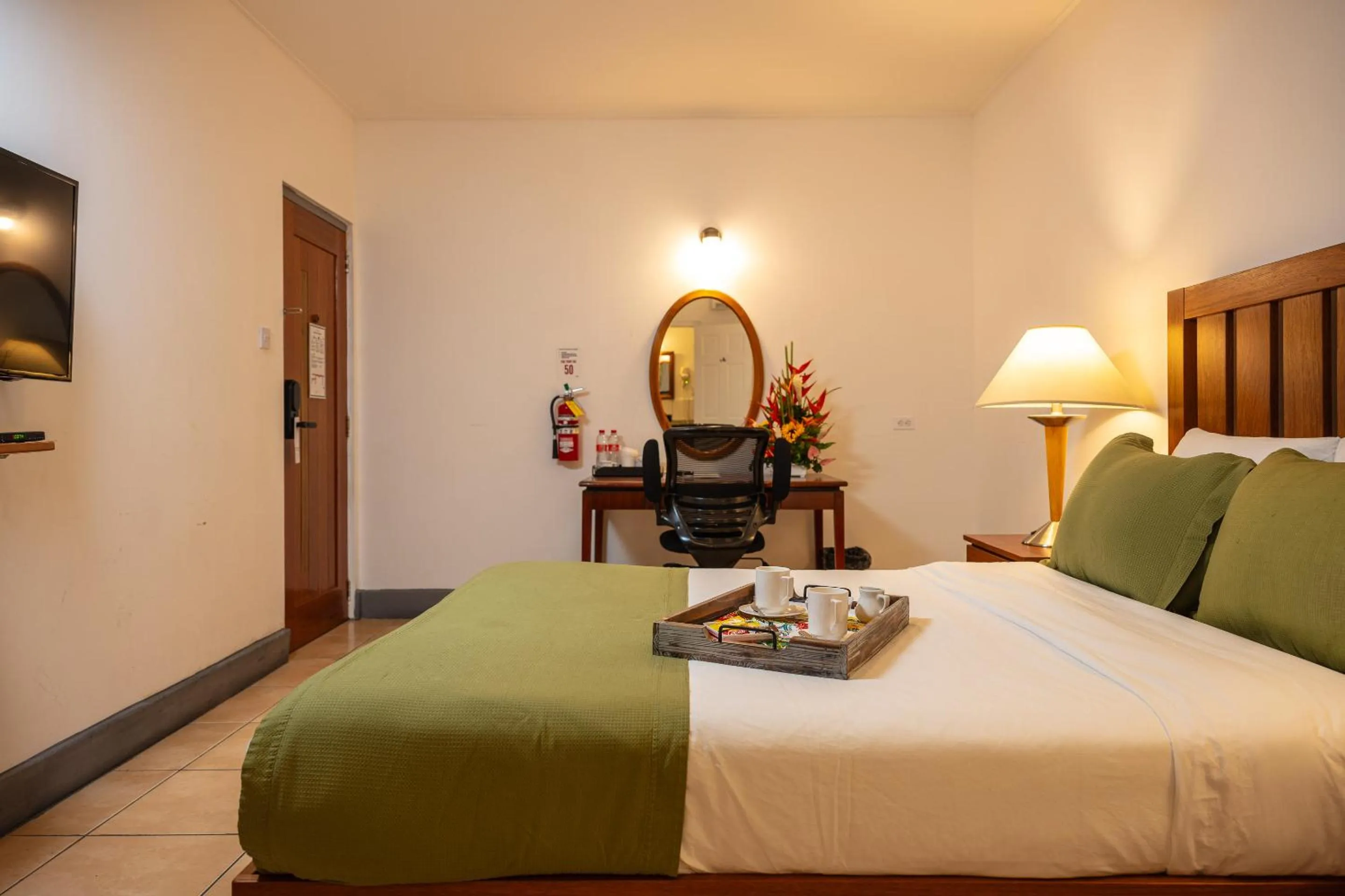 Bed in Grand Coastal Hotel