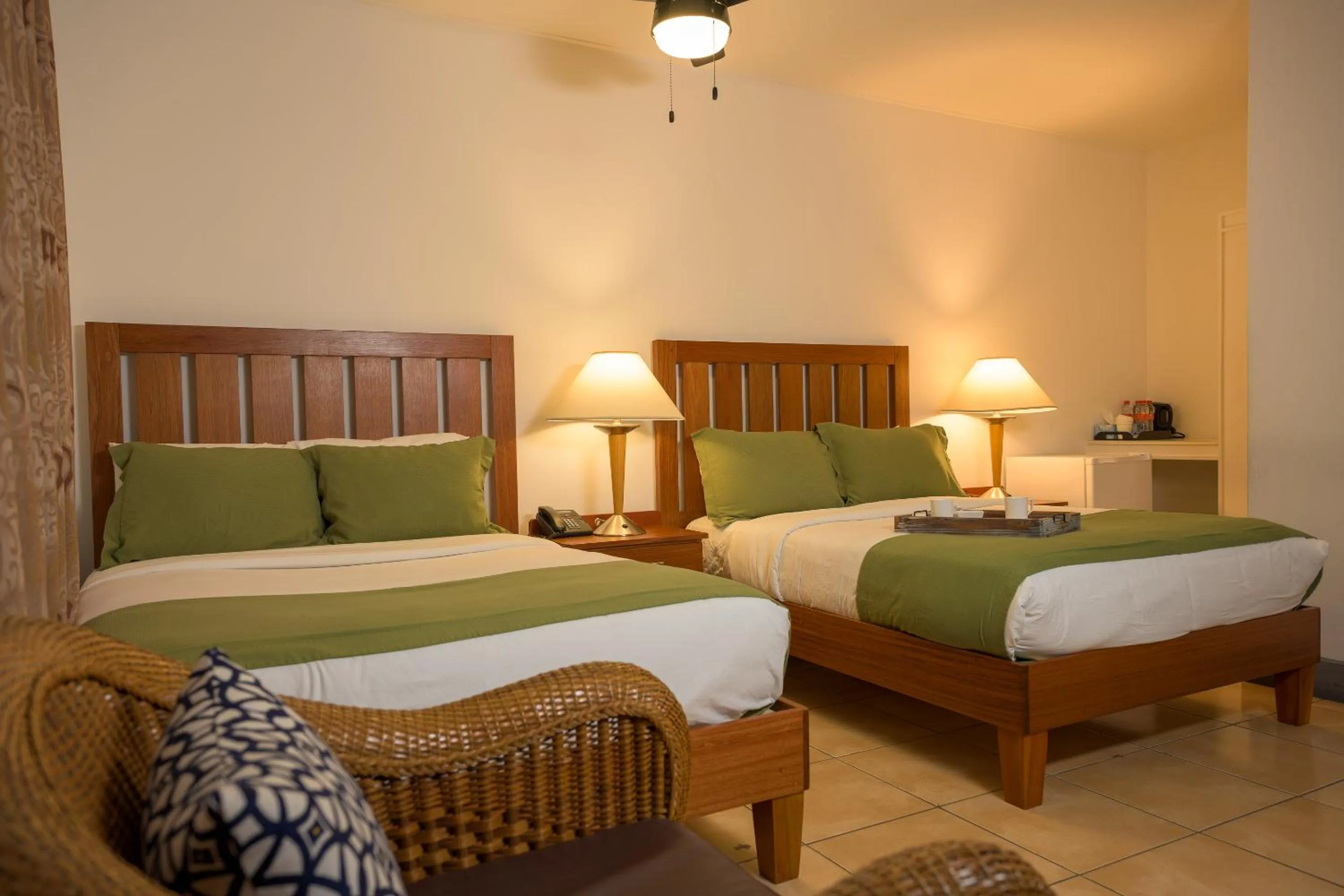 Bed in Grand Coastal Hotel