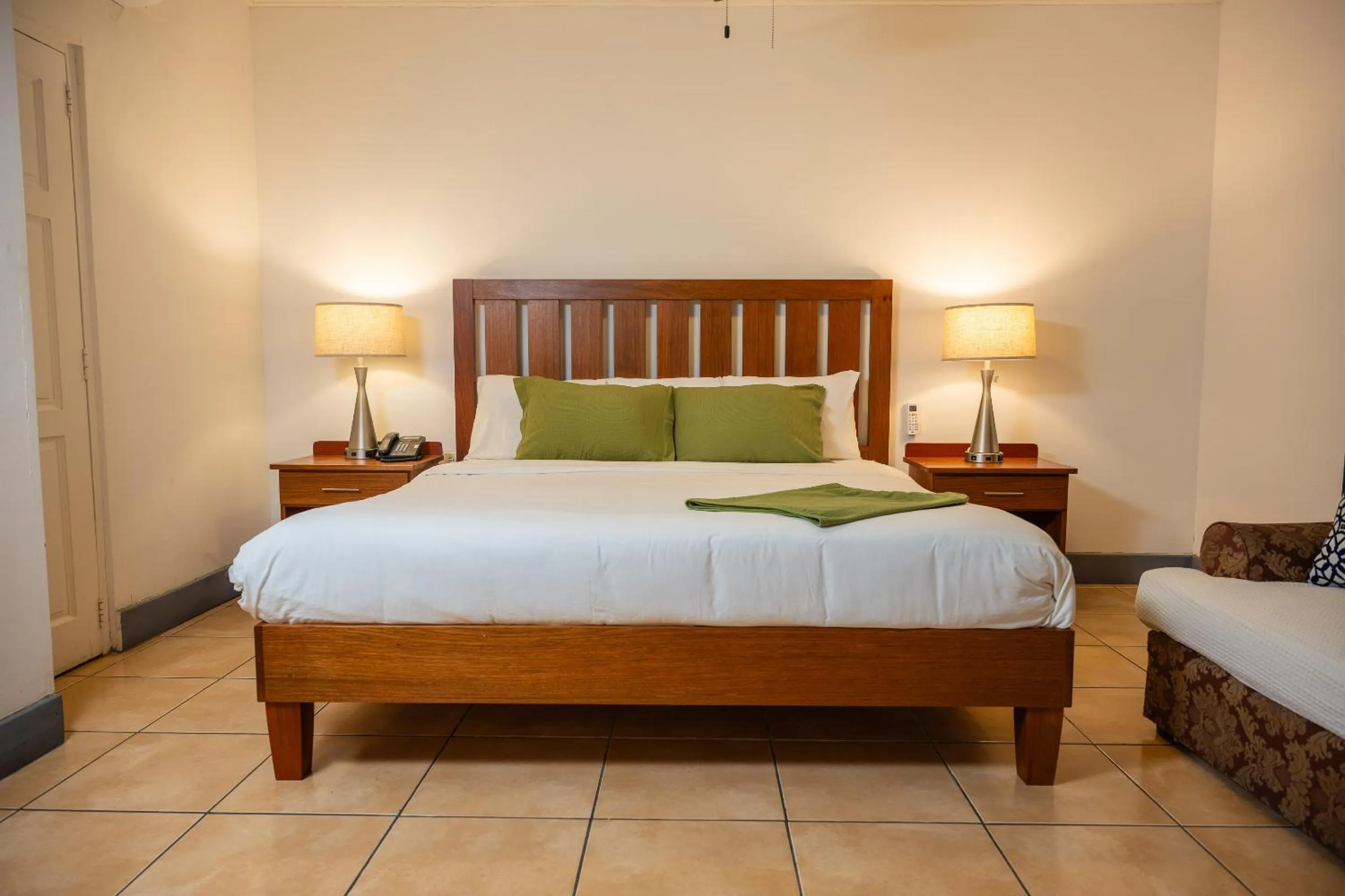 Bed in Grand Coastal Hotel