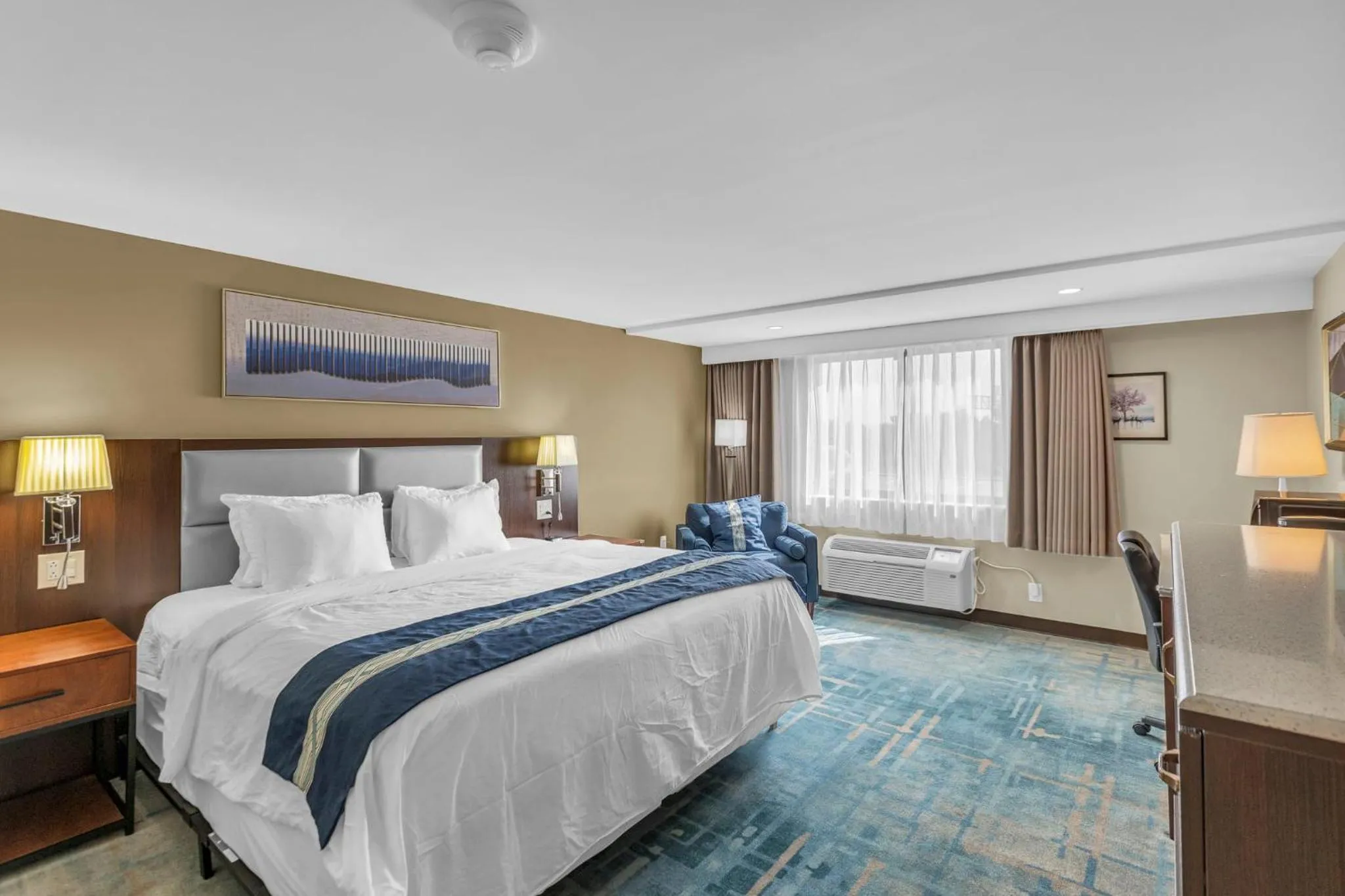 Bed in KC Inn Hotel Kansas City