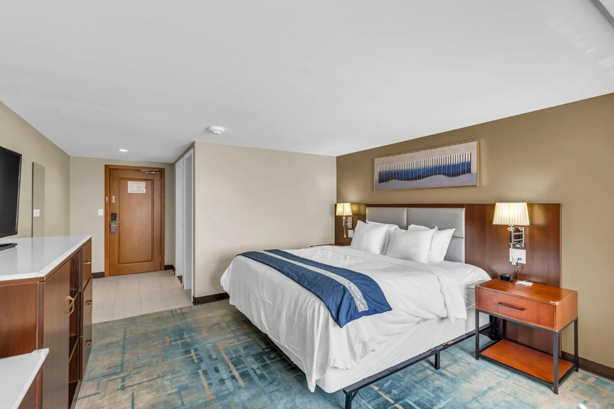 Bed in KC Inn Hotel Kansas City