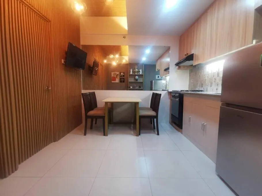 Kitchen or kitchenette in Naga City Stylish Condo