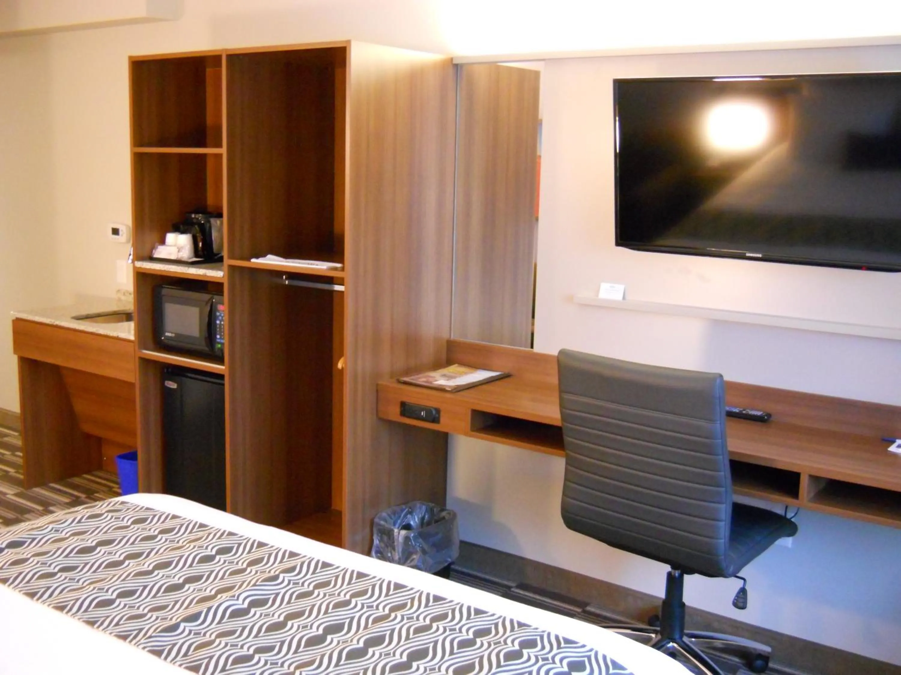 Bed in Microtel Inn & Suites Sault Ste. Marie