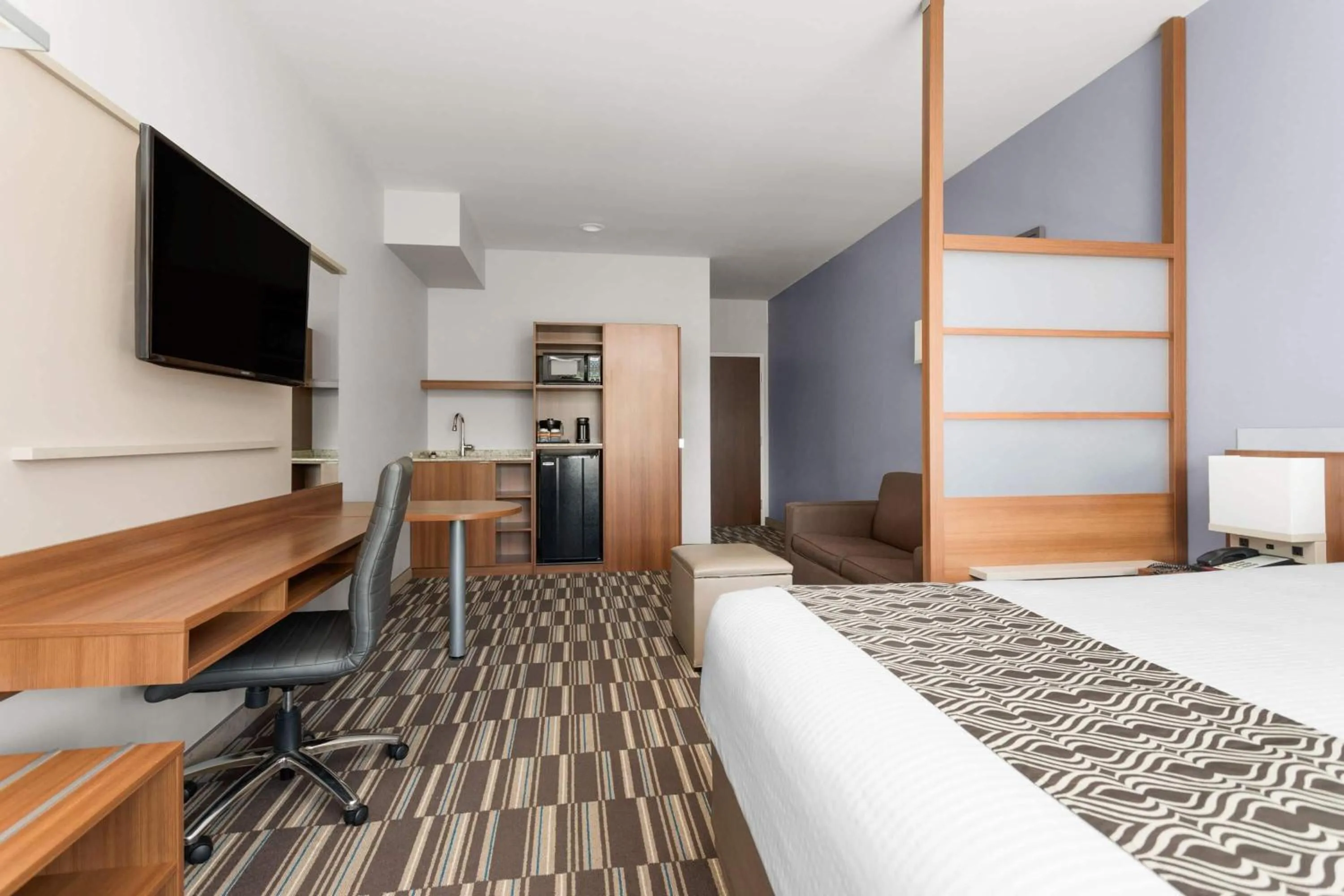 Photo of the whole room, Bed in Microtel Inn & Suites Sault Ste. Marie