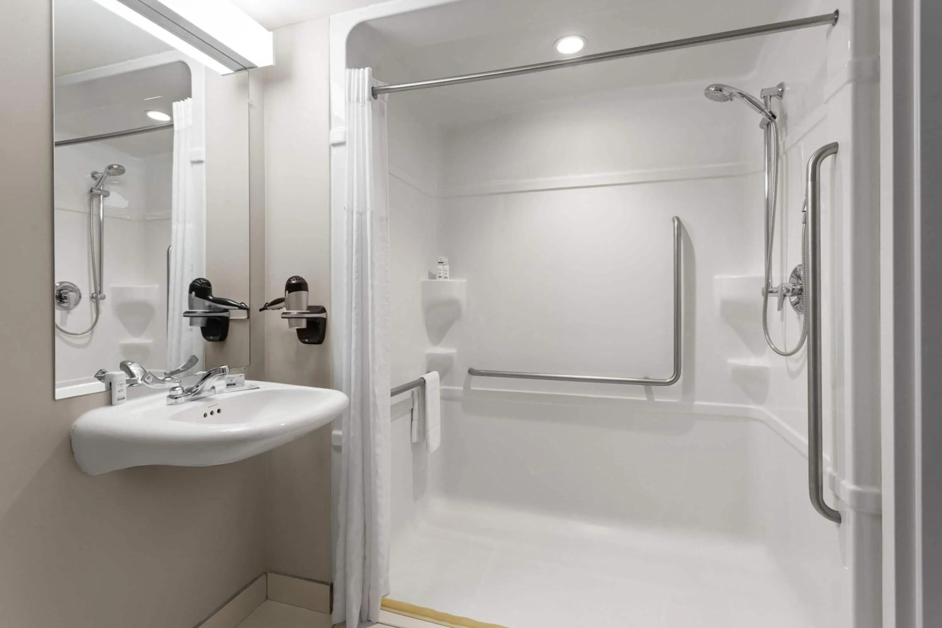 Shower in Microtel Inn & Suites Sault Ste. Marie