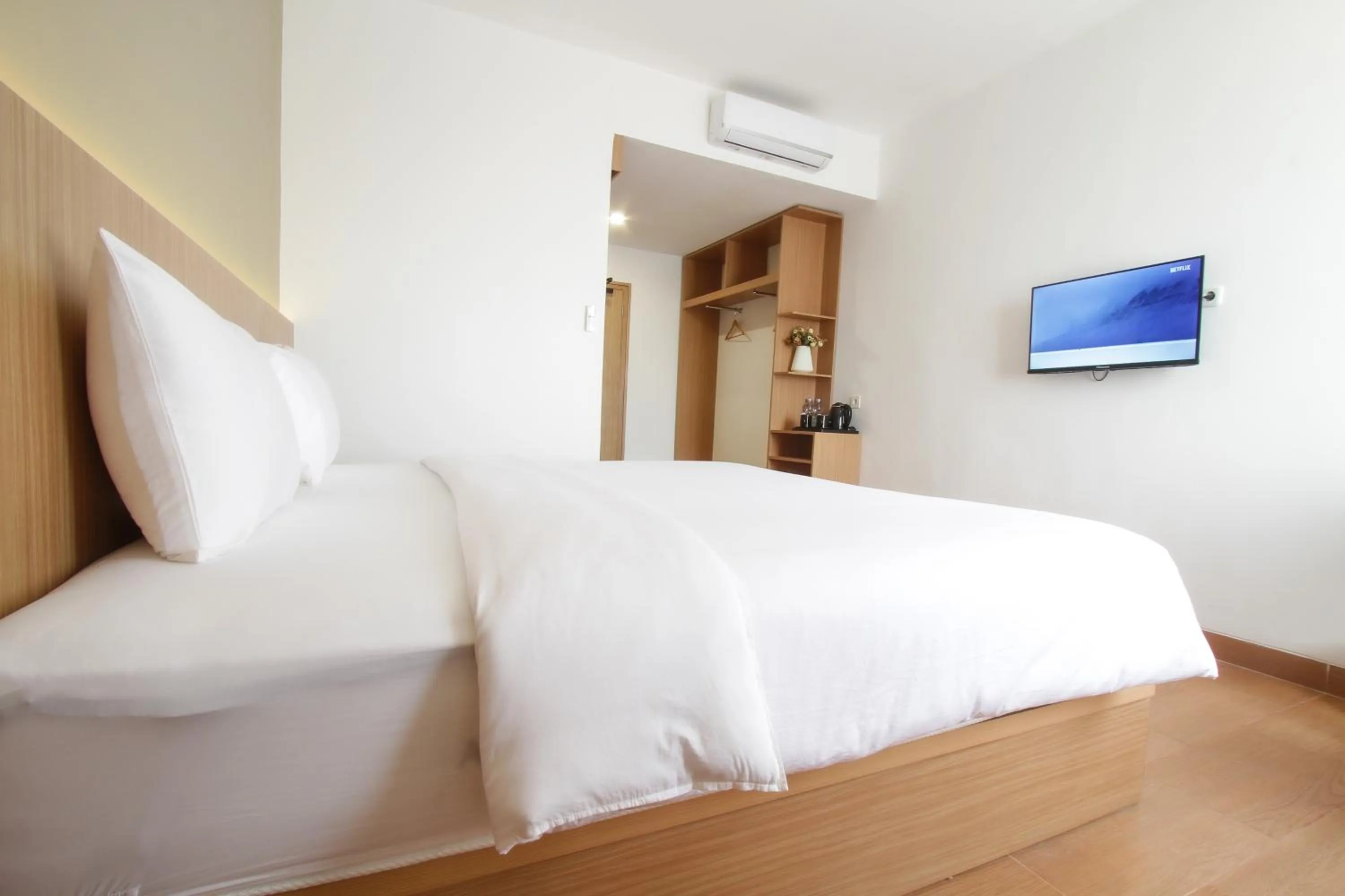 Bedroom in Sepanak Hotel by Amazing