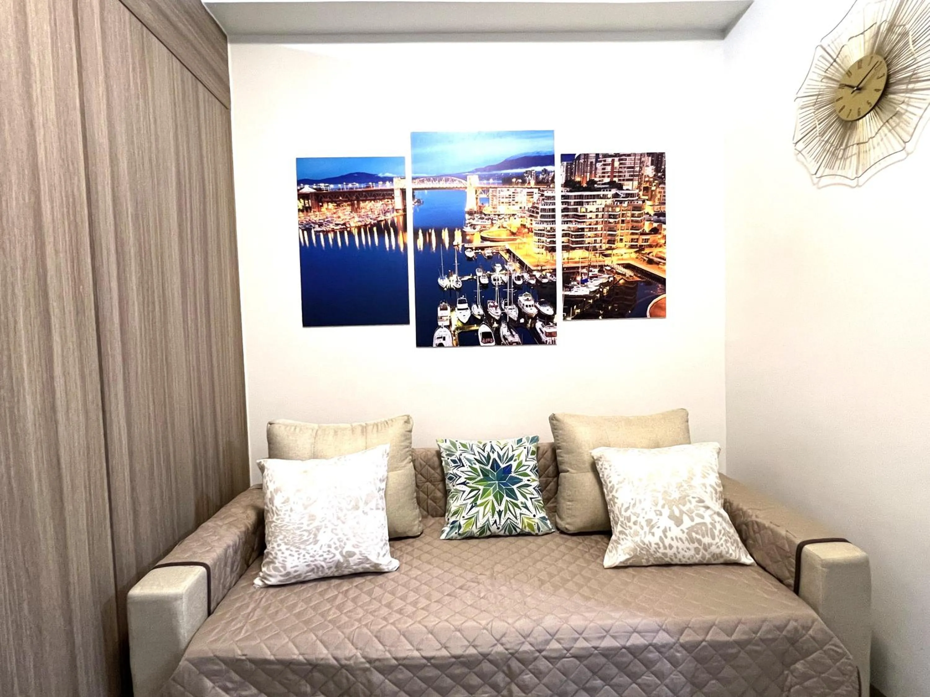 Living room, Bed in Shore Residences MOA Dynastel Staycation