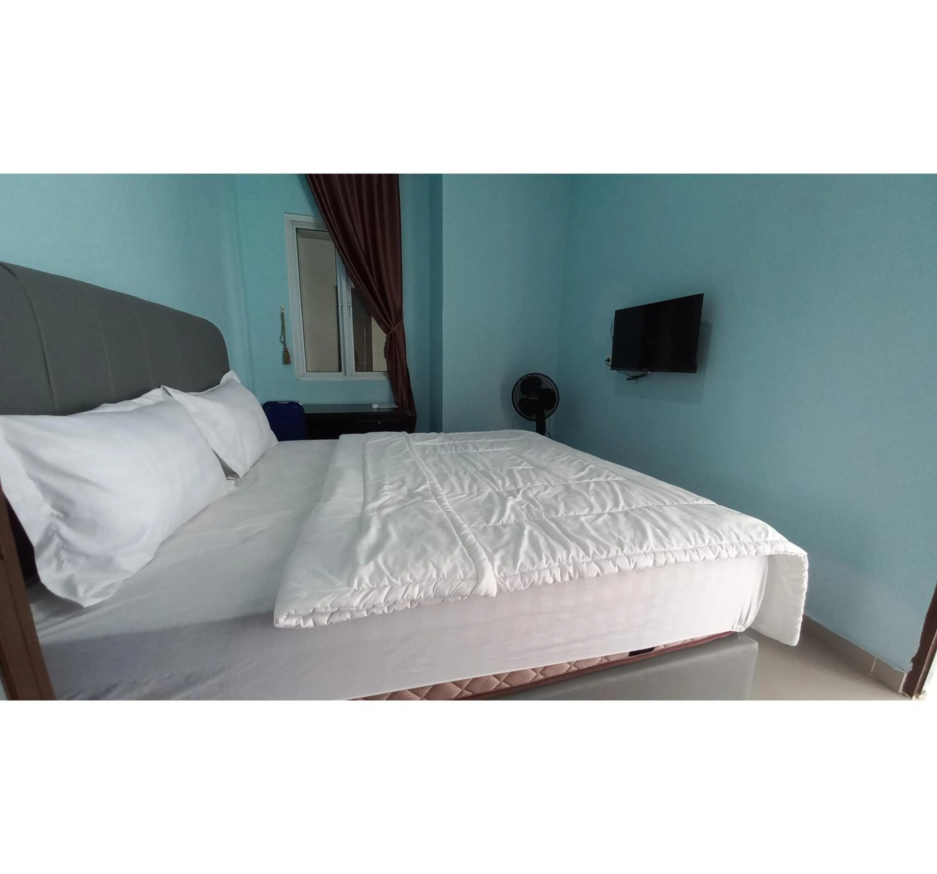 Bedroom, Bed in Hotel O Pinus Jaya SyariahNearTaman Amaryllis Pekanbaru