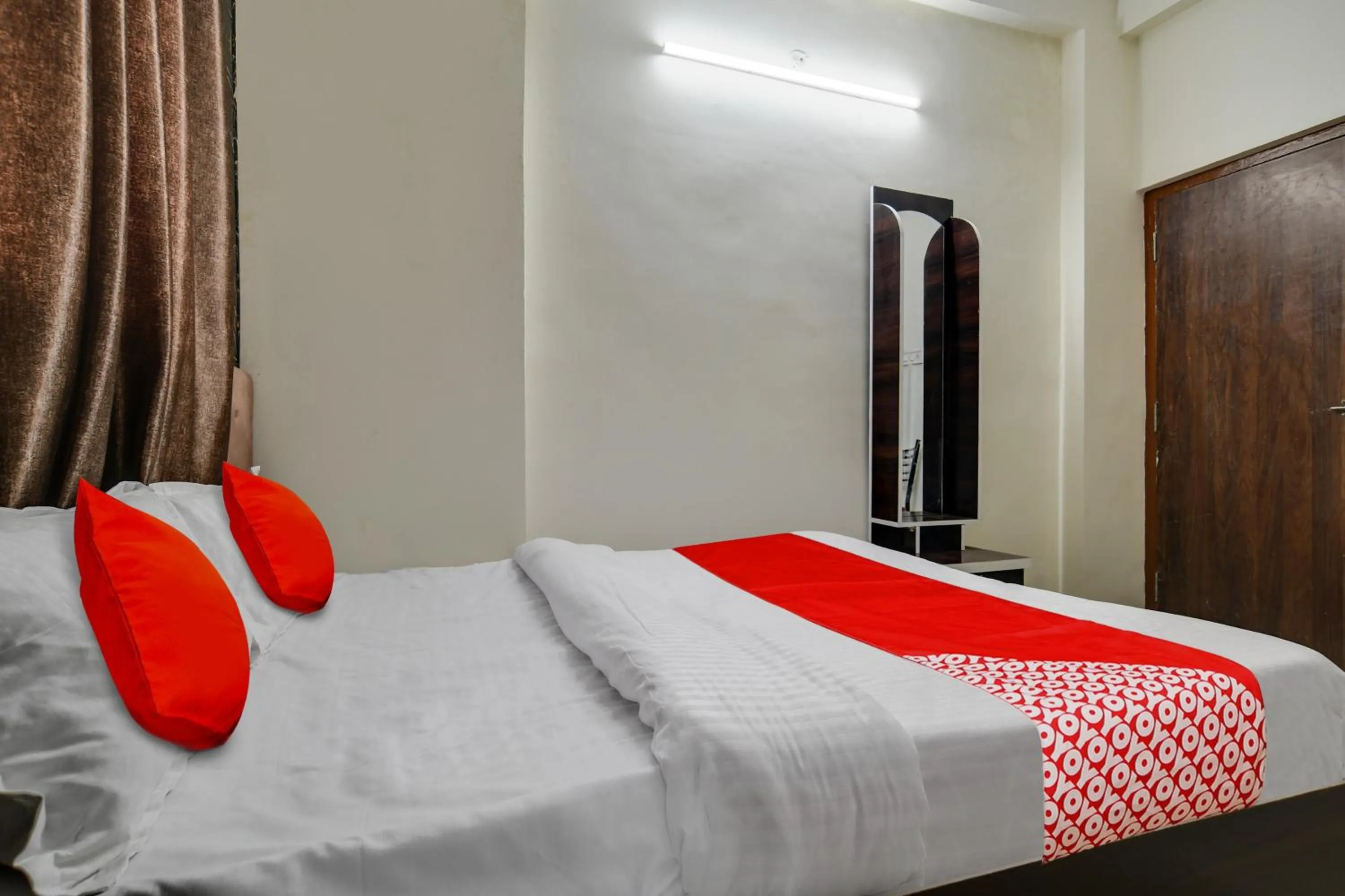 Bedroom in Hotel O Nitya