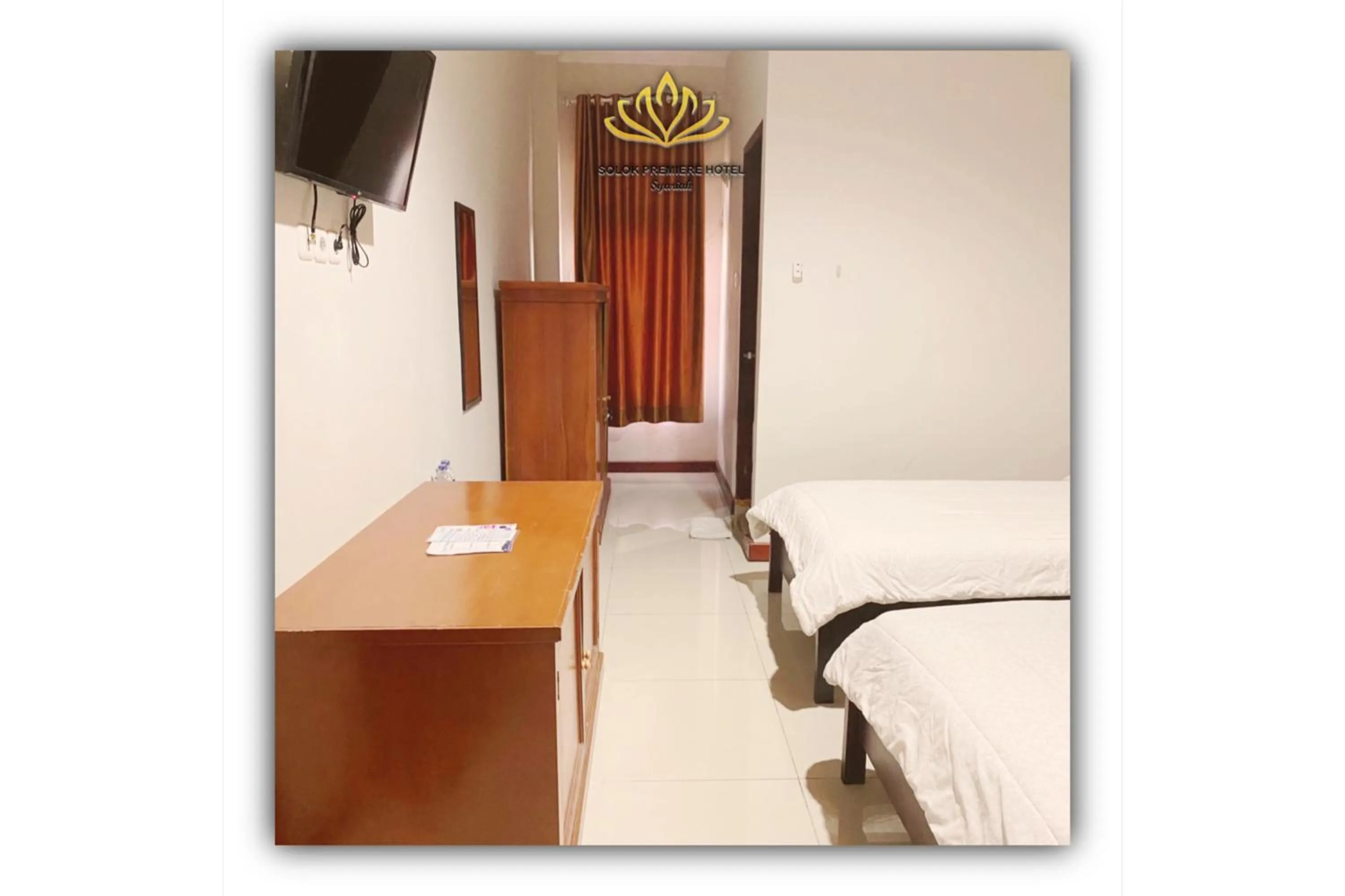 Bedroom in Solok Premier Hotel