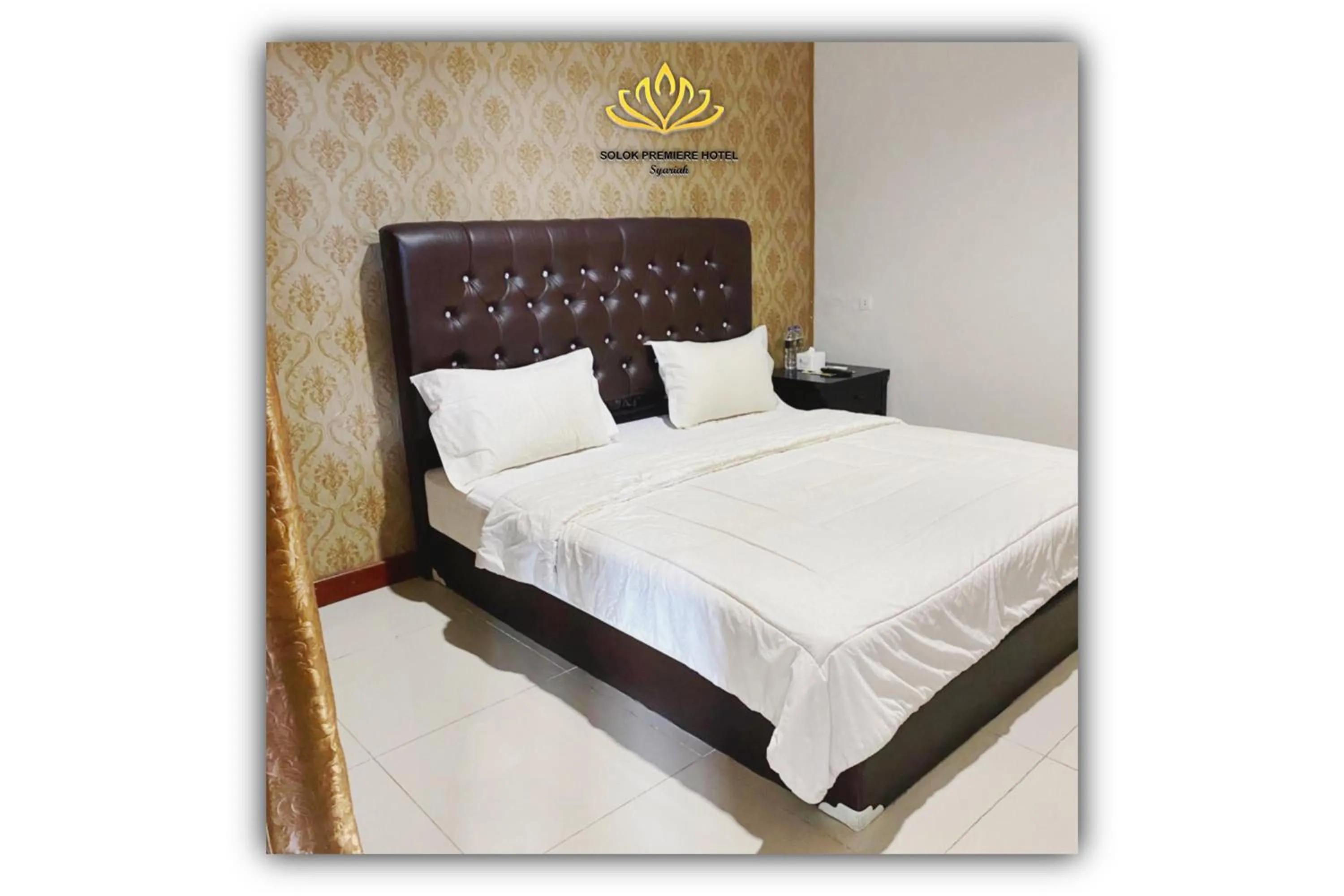 Bed in Solok Premier Hotel