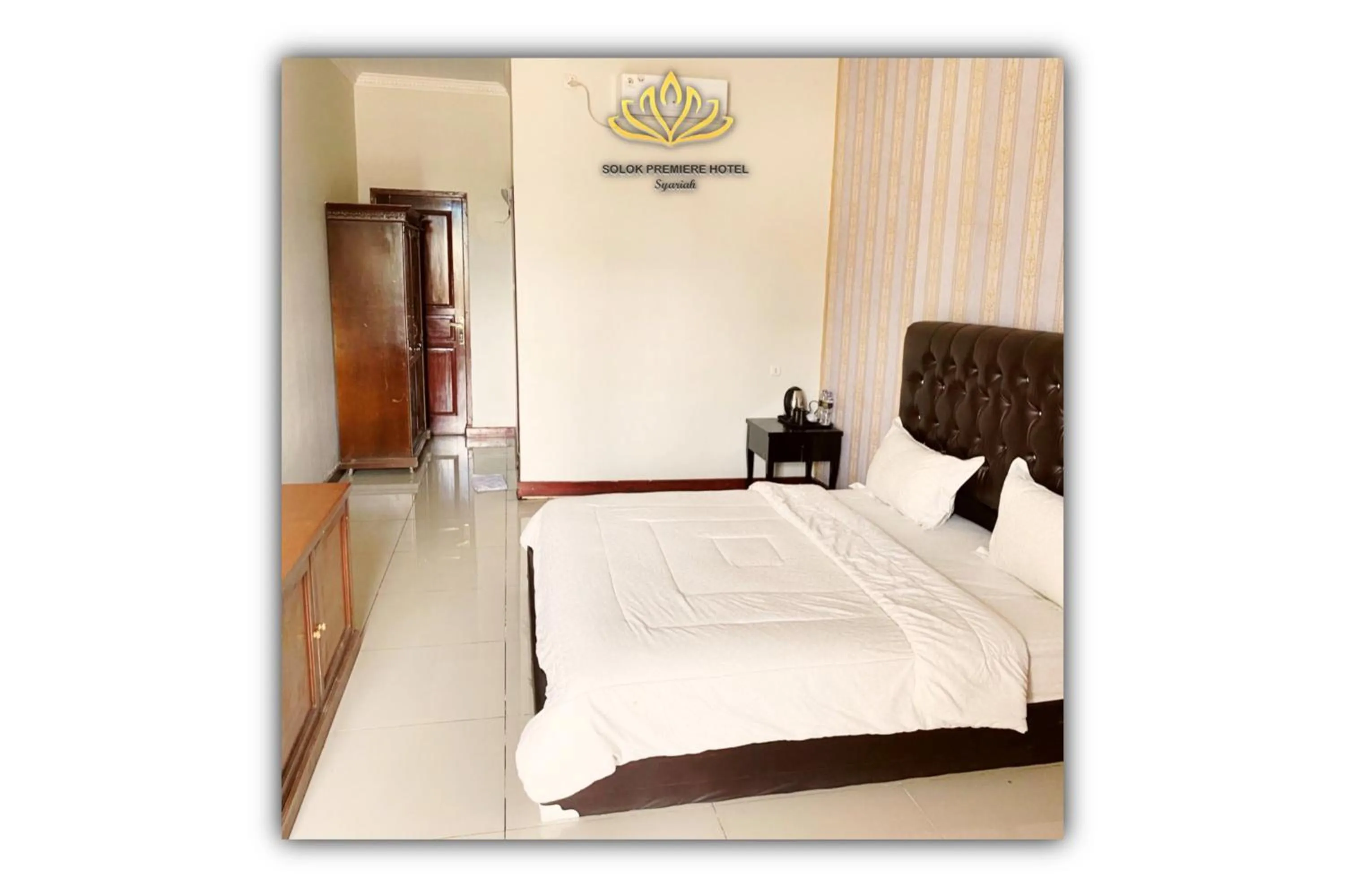 Bed in Solok Premier Hotel