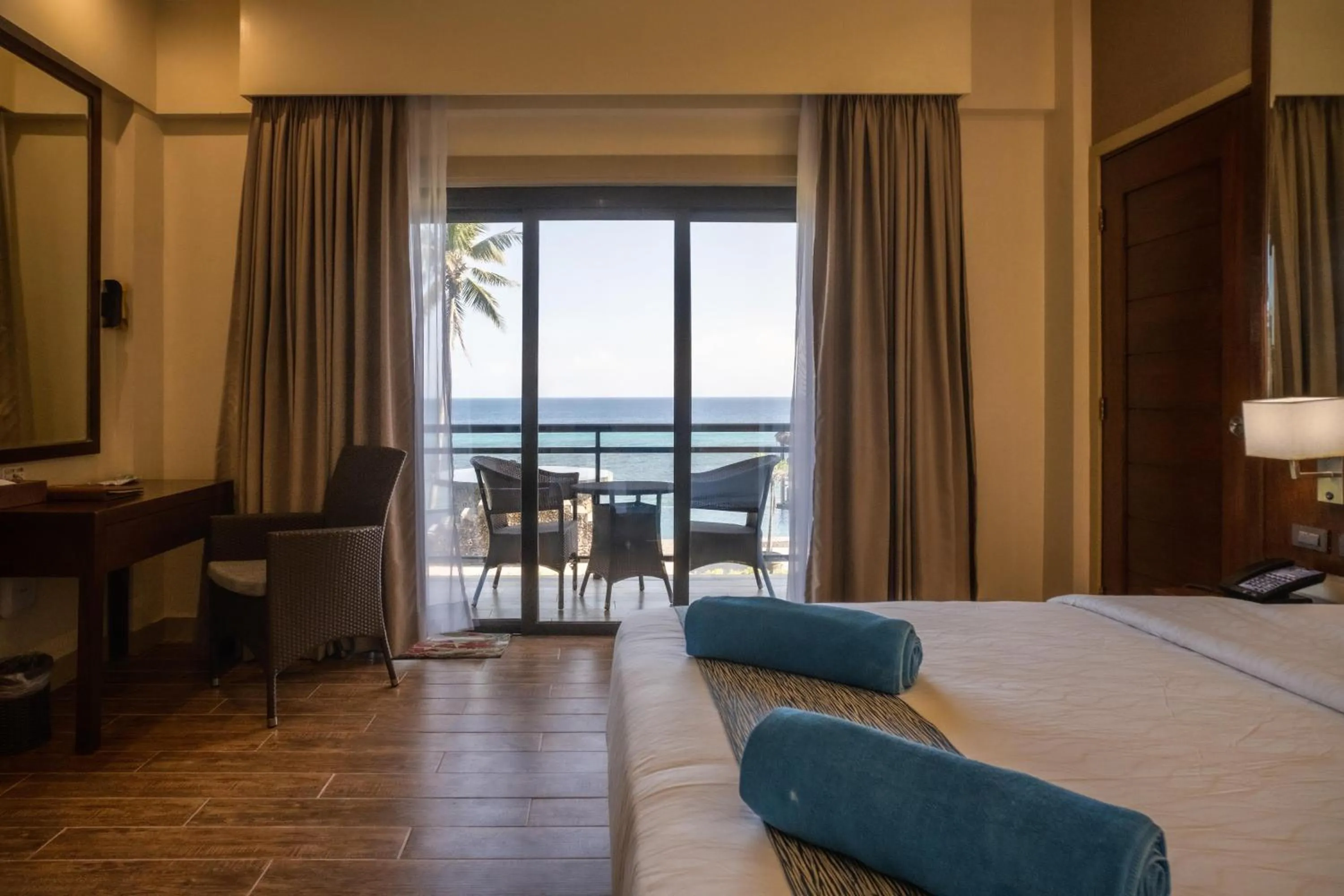 Bed in Parklane Bohol Resort and Spa